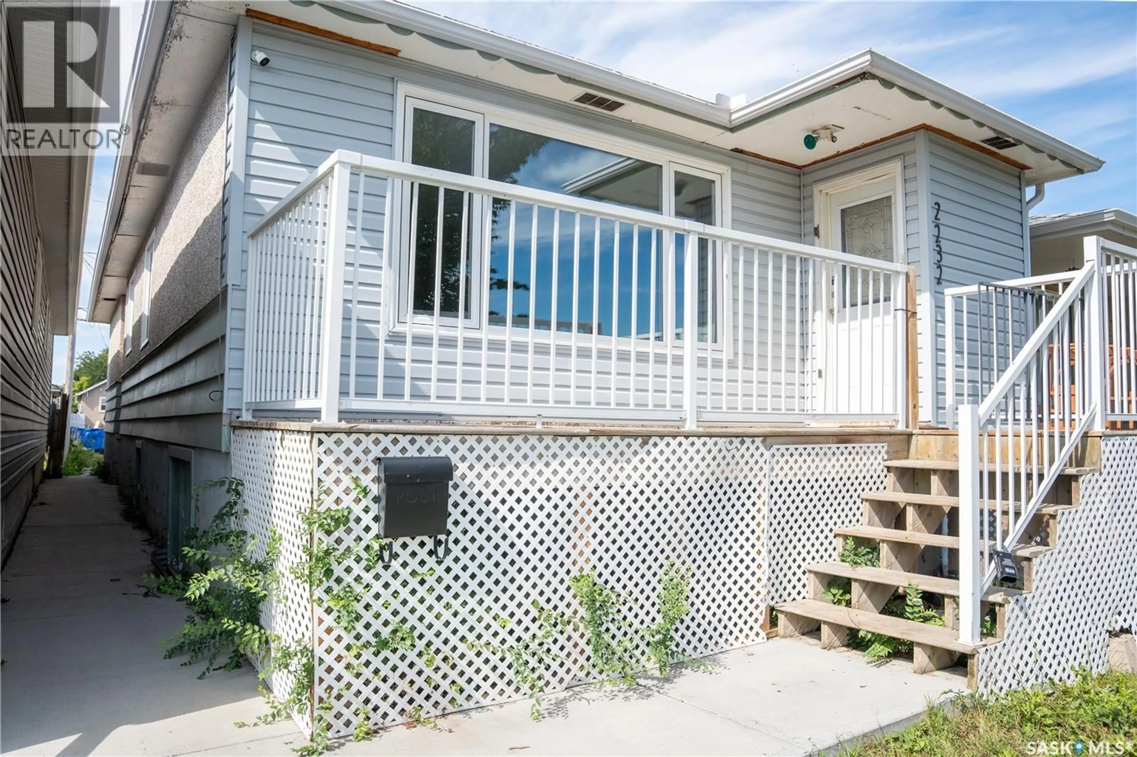 Home with vinyl exterior material, street for 2232 MCARA STREET, Regina Saskatchewan S4N2W1
