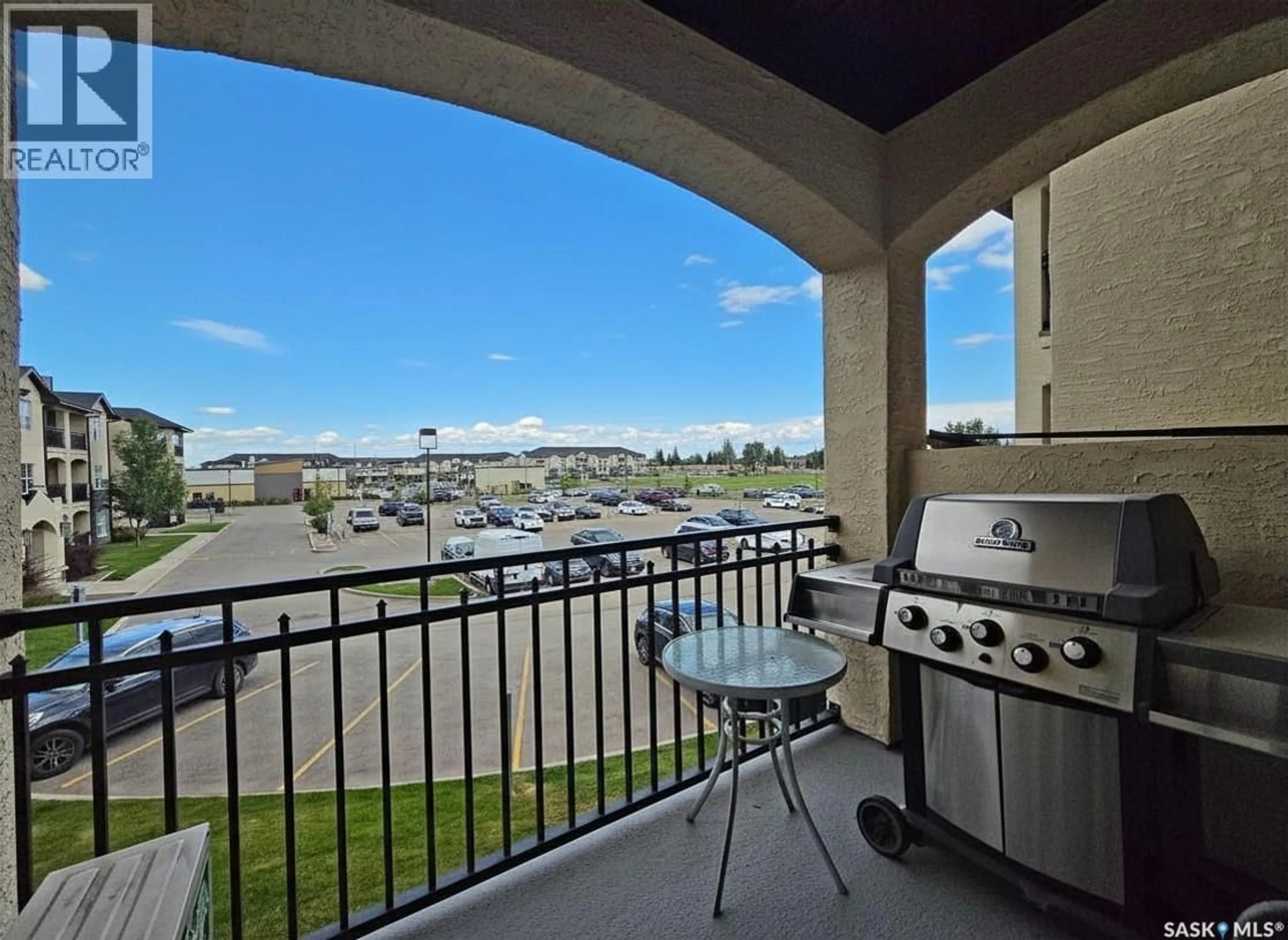 Patio, water/lake/river/ocean view for 211 - 216 LEDINGHAM STREET, Saskatoon Saskatchewan S7V0C5
