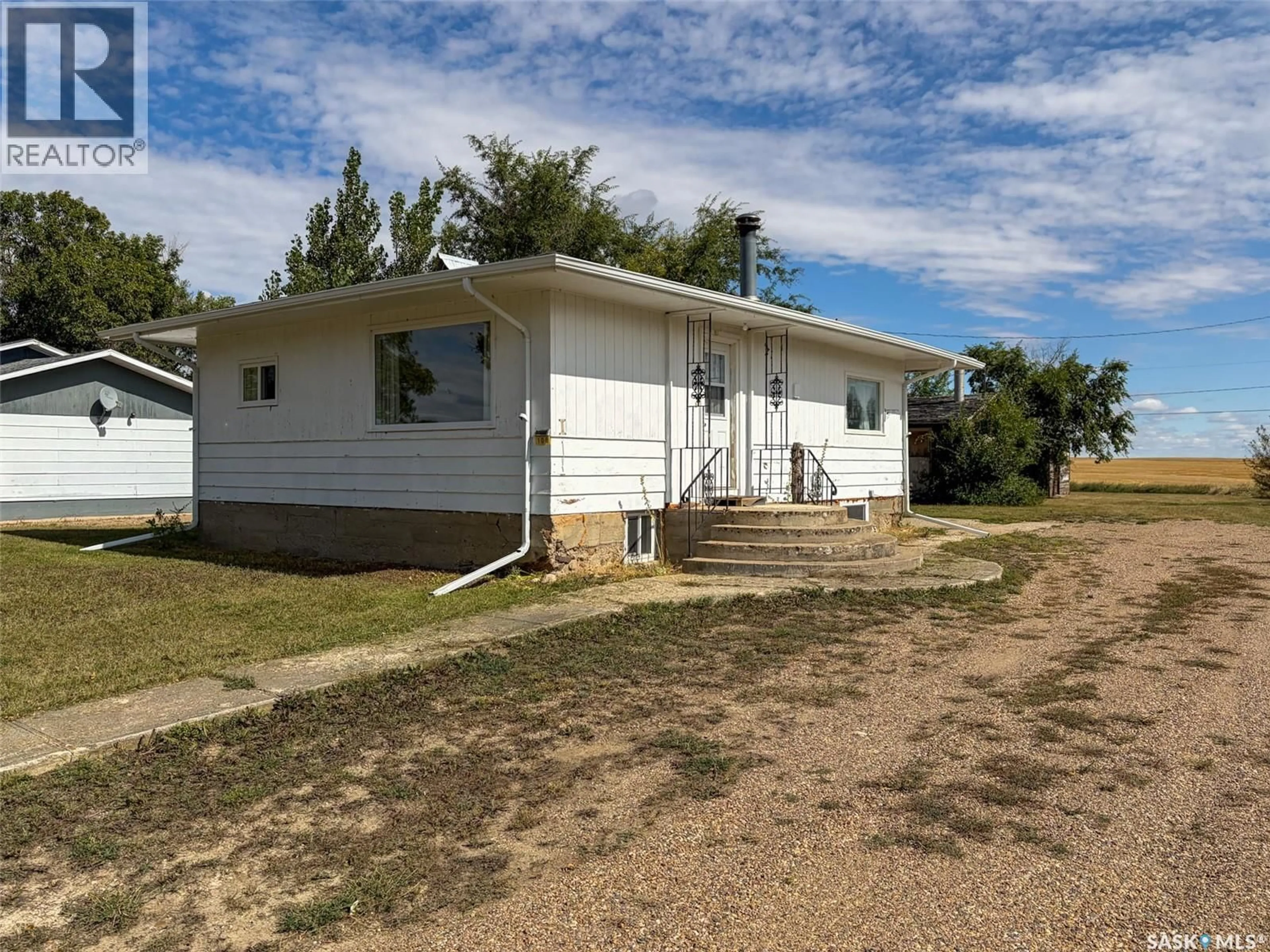 A pic from outside/outdoor area/front of a property/back of a property/a pic from drone, street for 108 1ST STREET, Climax Saskatchewan S0N0N0