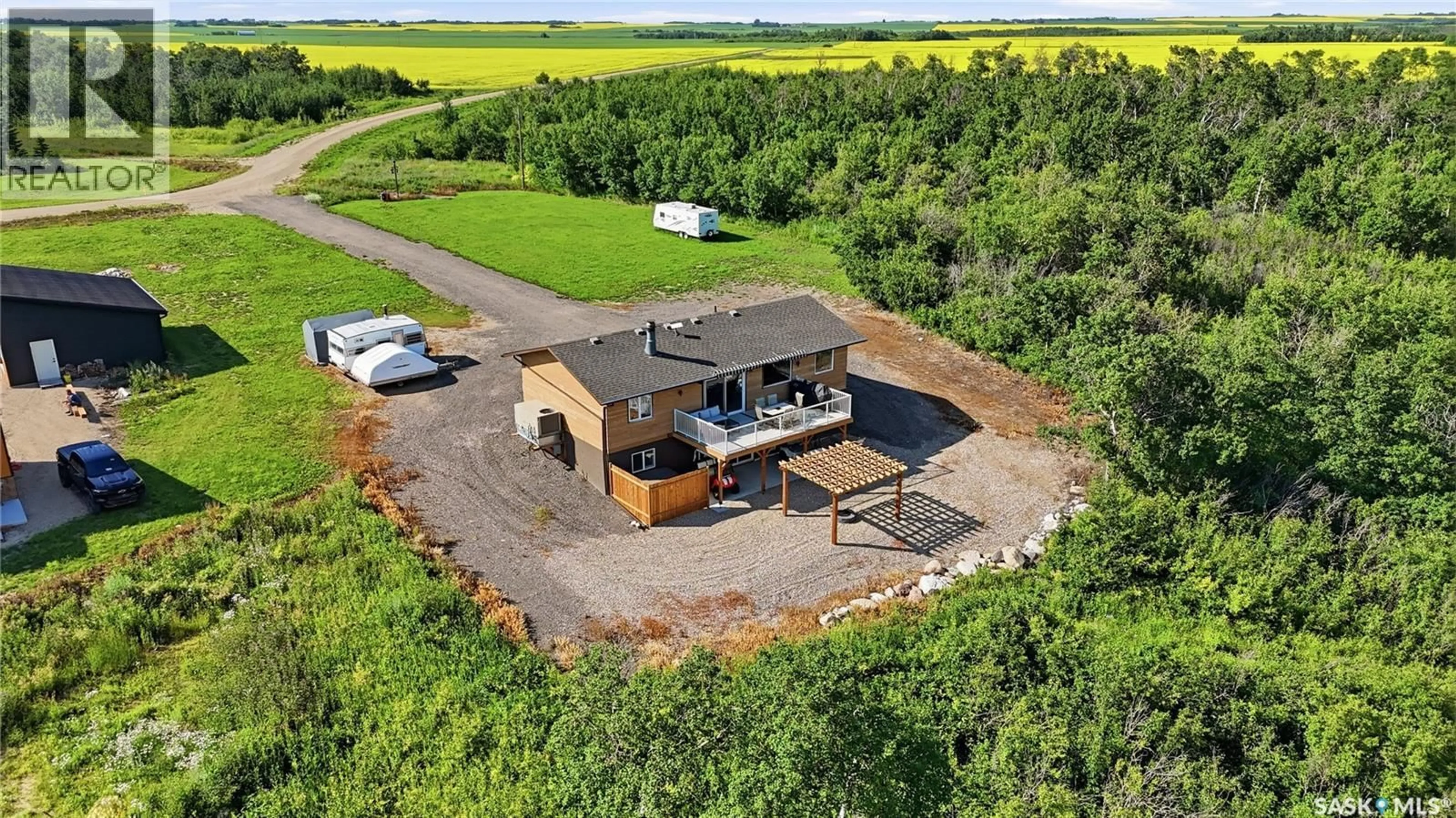 A pic from outside/outdoor area/front of a property/back of a property/a pic from drone, building for 7000 WACASA RIDGE, Wakaw Lake Saskatchewan S0K4P0