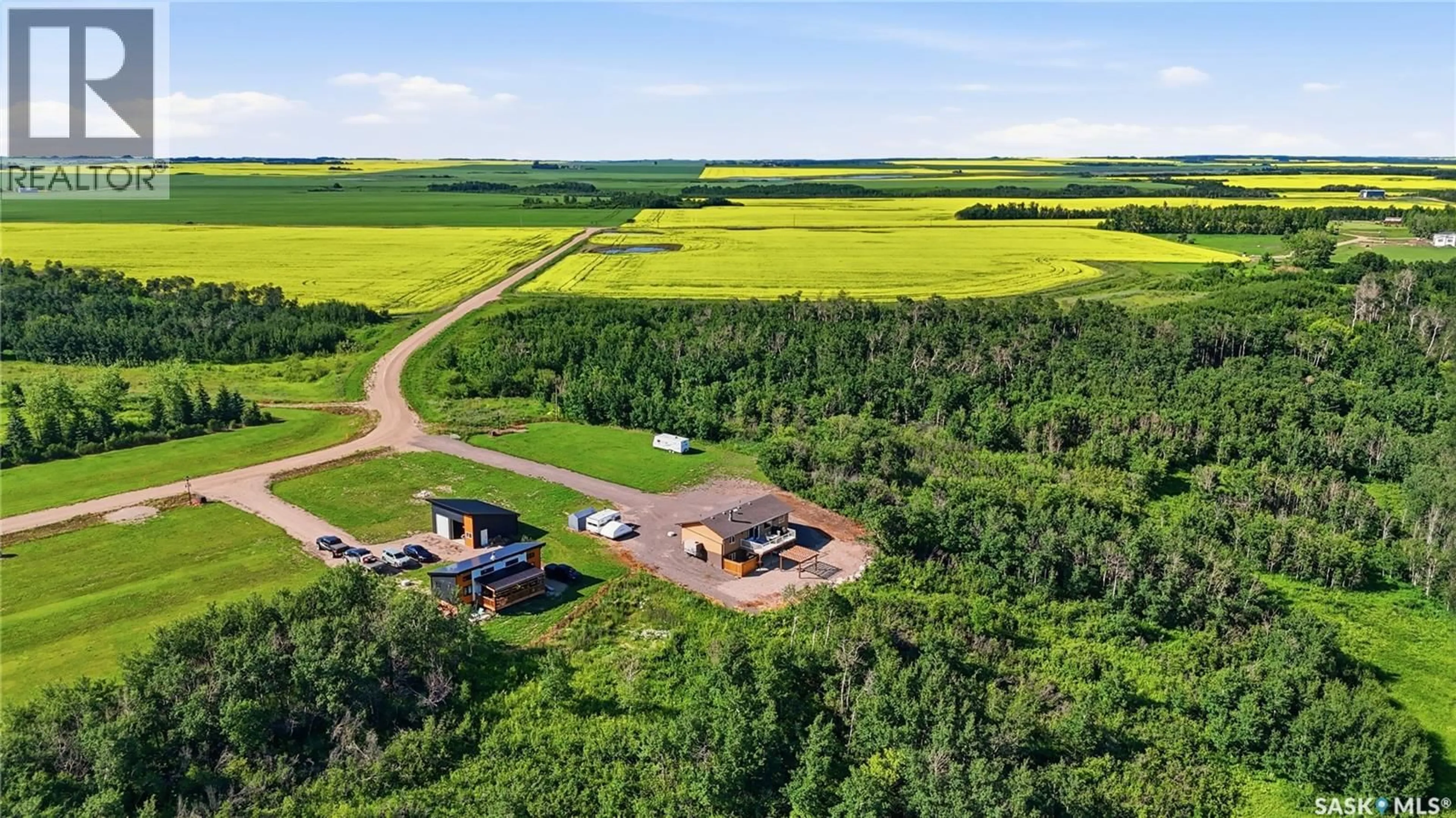 A pic from outside/outdoor area/front of a property/back of a property/a pic from drone, unknown for 7000 WACASA RIDGE, Wakaw Lake Saskatchewan S0K4P0