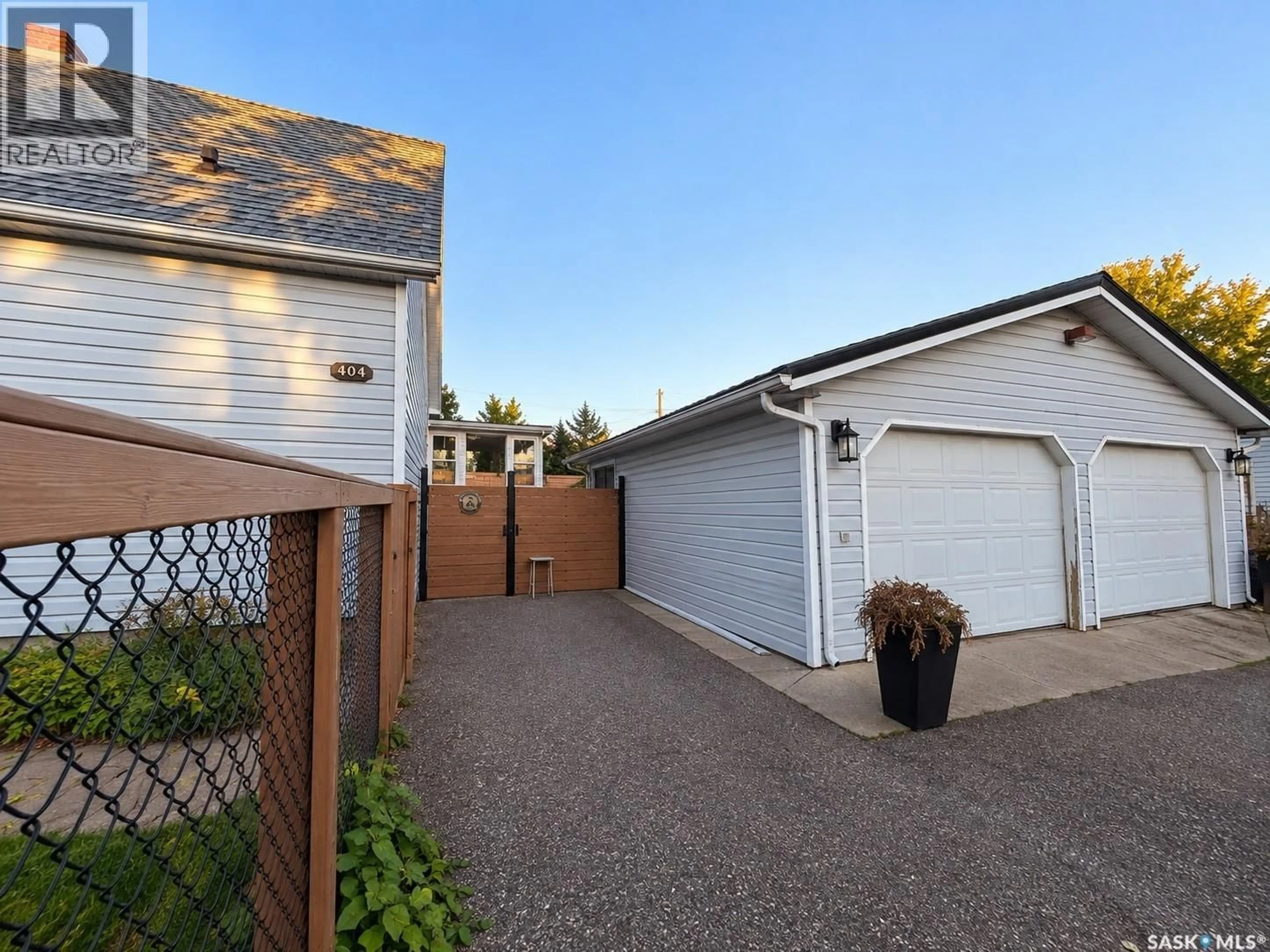 Home with vinyl exterior material, street for 404 ESAU STREET, Meadow Lake Saskatchewan S9X1A4
