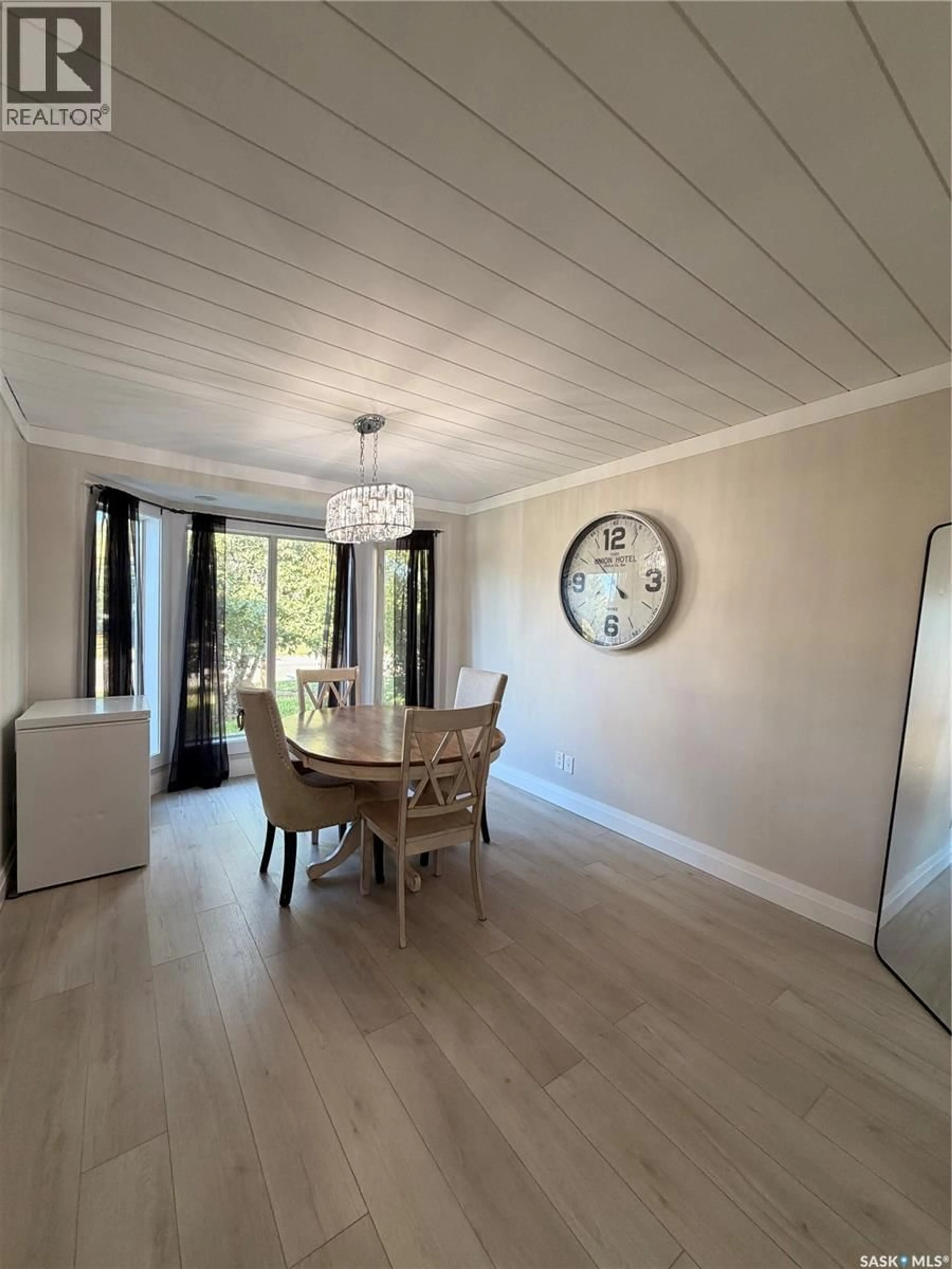 Dining room, wood/laminate floor for 404 ESAU STREET, Meadow Lake Saskatchewan S9X1A4