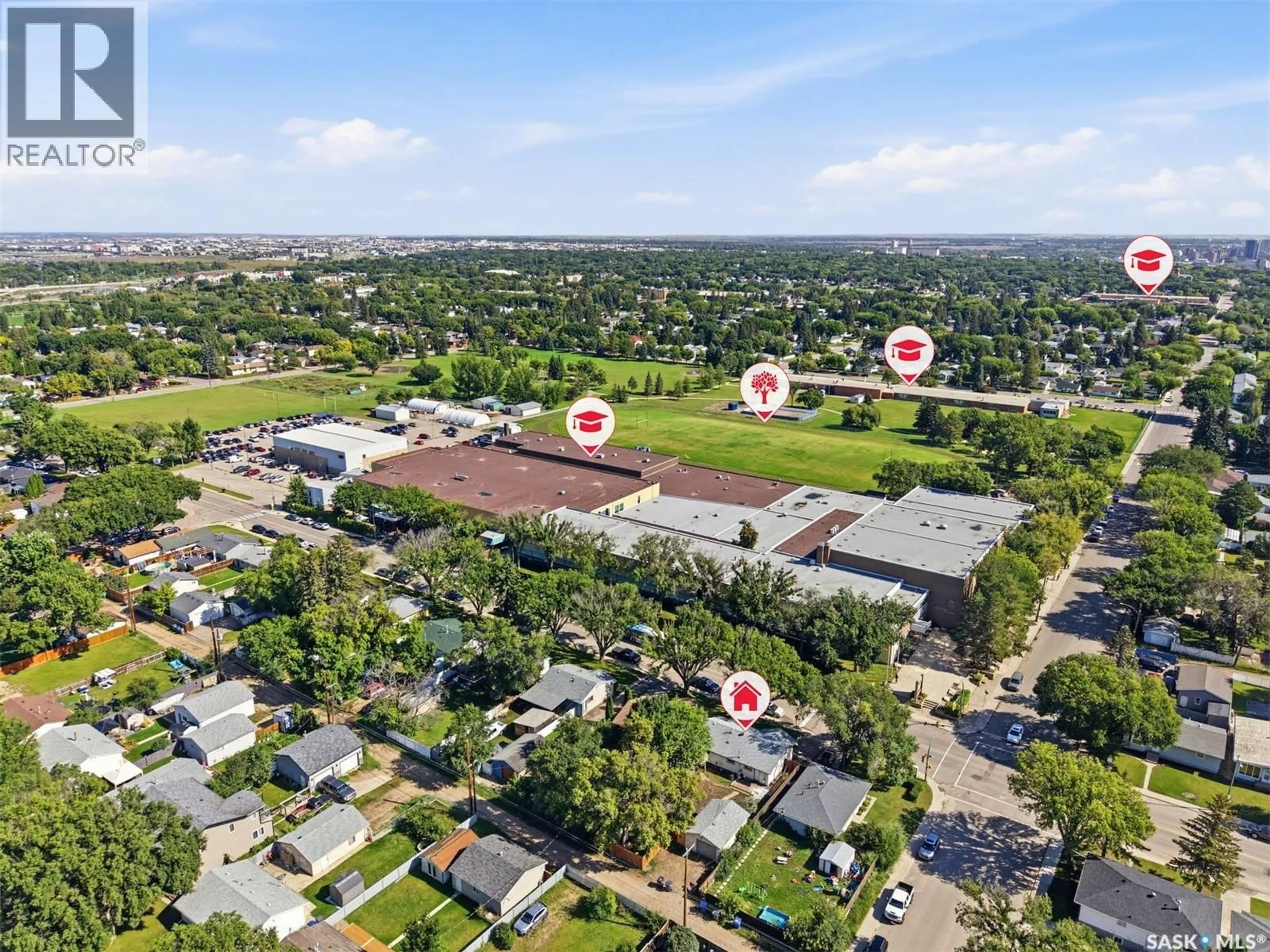 A pic from outside/outdoor area/front of a property/back of a property/a pic from drone, street for 405 W AVENUE N, Saskatoon Saskatchewan S7L3G9