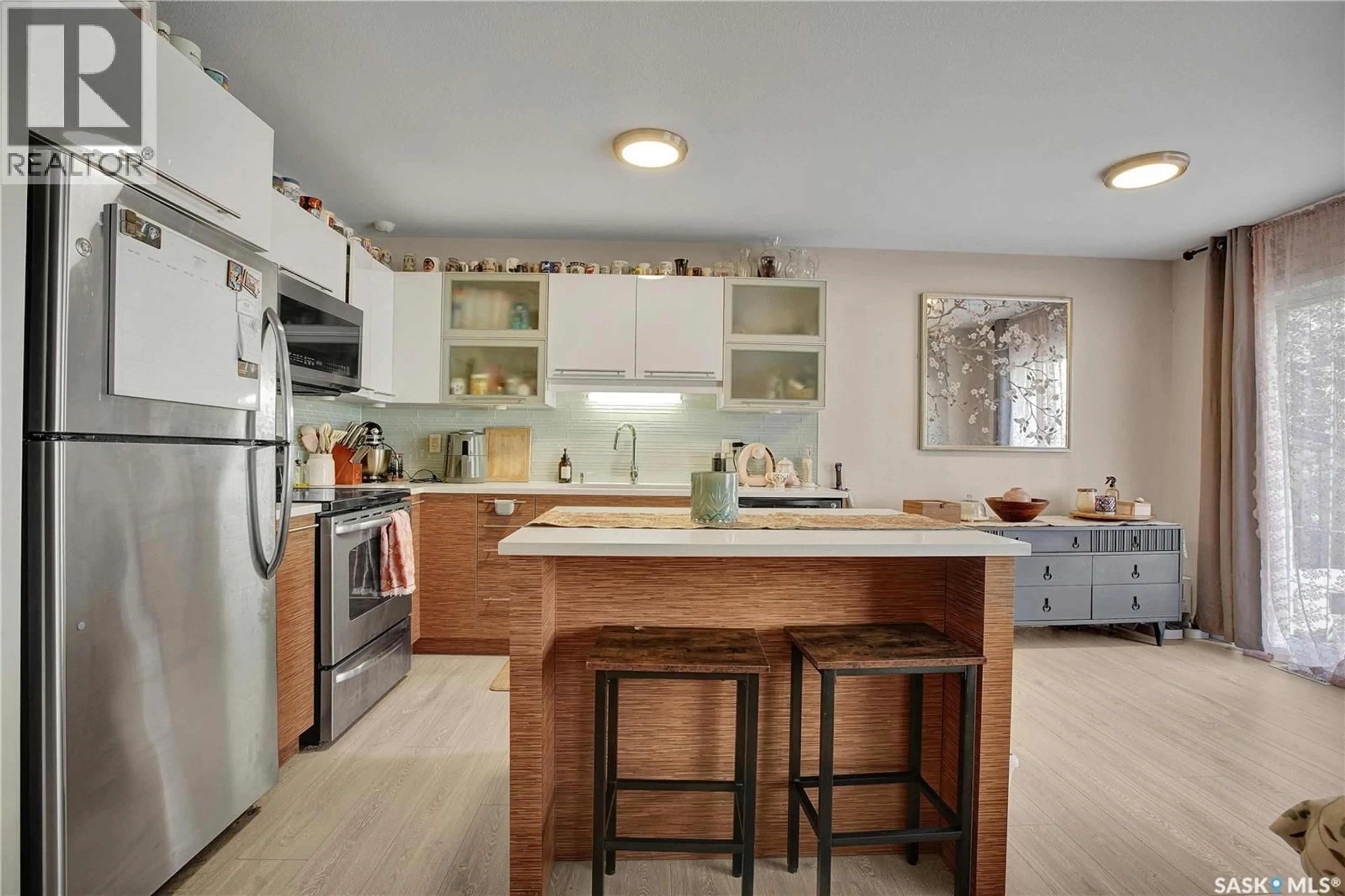 Open concept kitchen, ceramic/tile floor for 106 - 410 HUNTER ROAD, Saskatoon Saskatchewan S7T0L5