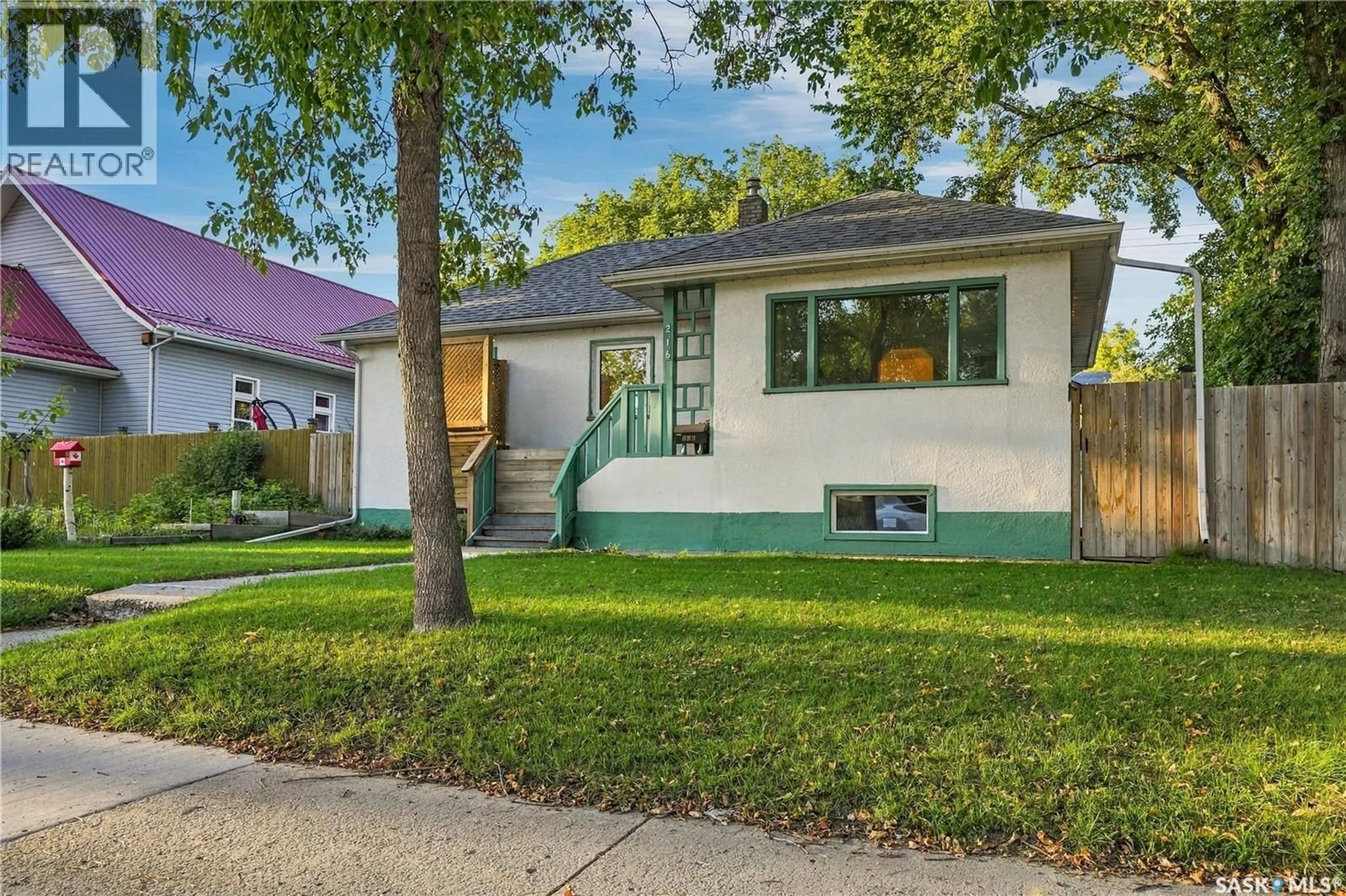 Home with vinyl exterior material, street for 216 25TH STREET, Saskatoon Saskatchewan S7L0C4