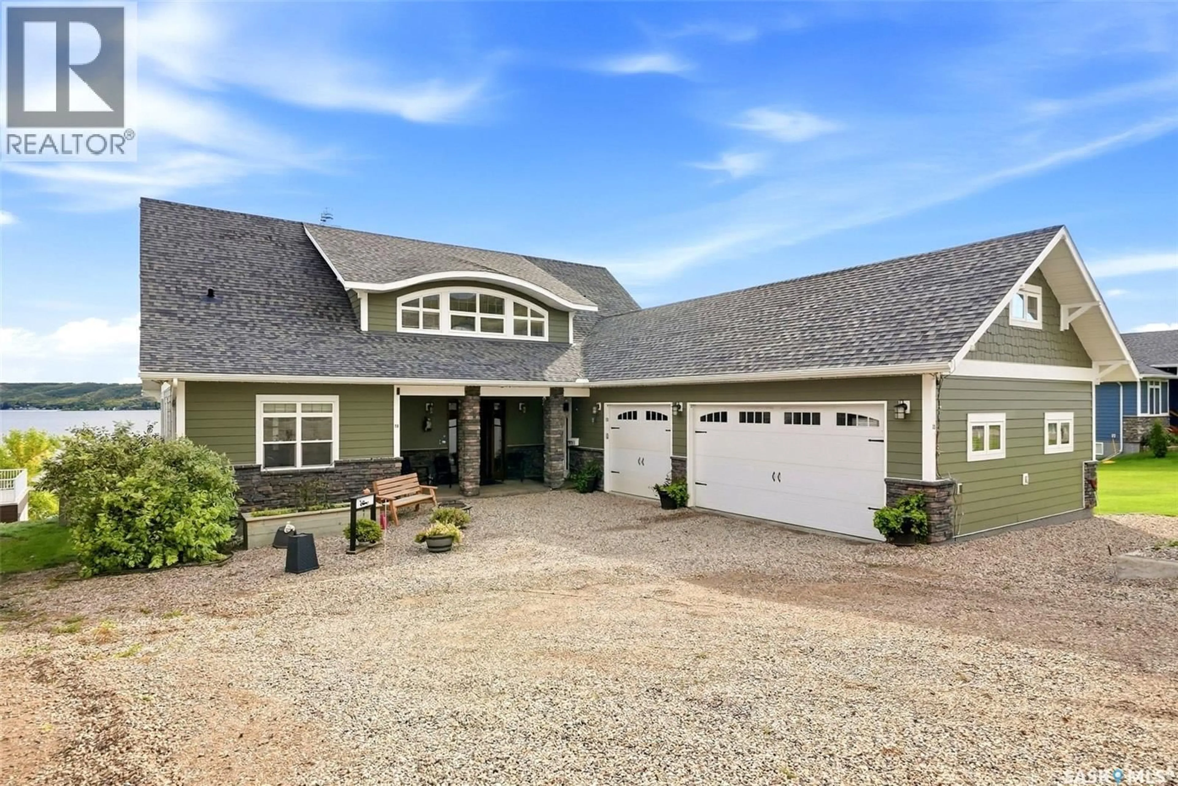 Home with vinyl exterior material, street for 50 AARON PLACE, Echo Lake Saskatchewan S0G1S0