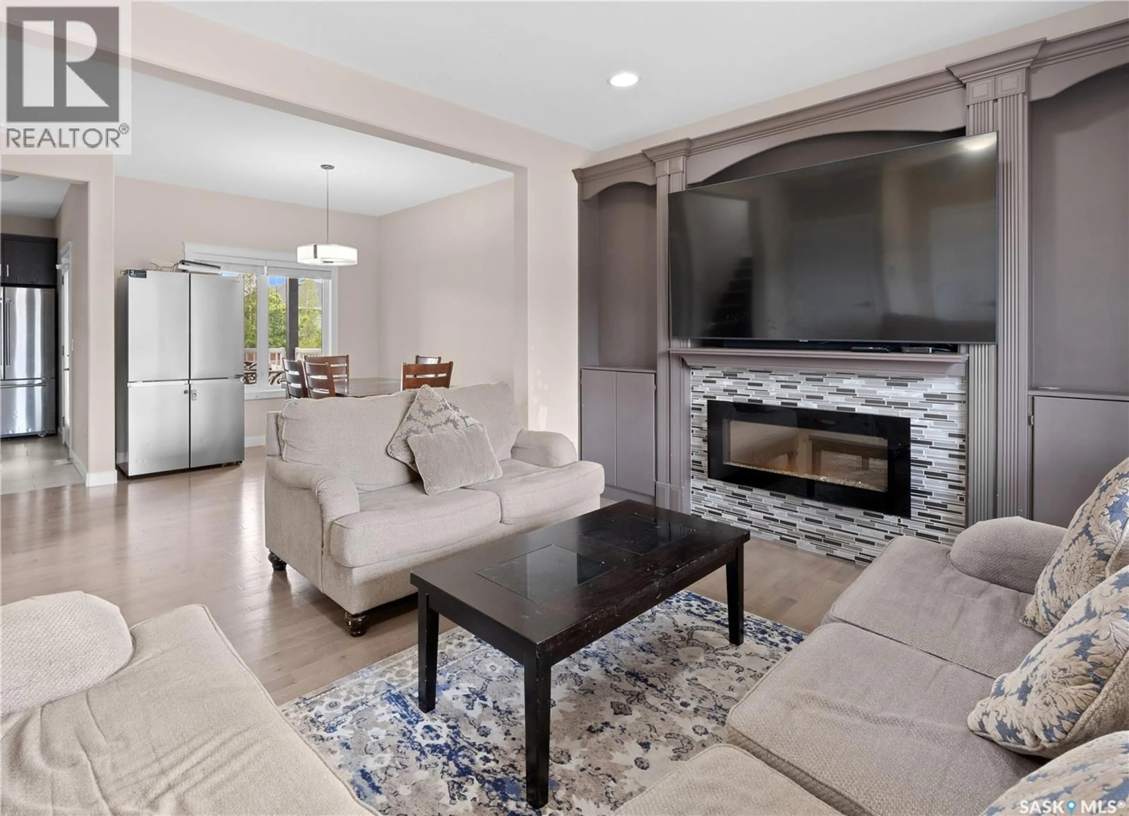 Living room with furniture, ceramic/tile floor for 526 MAPLE CRESCENT, Warman Saskatchewan S0K4S2