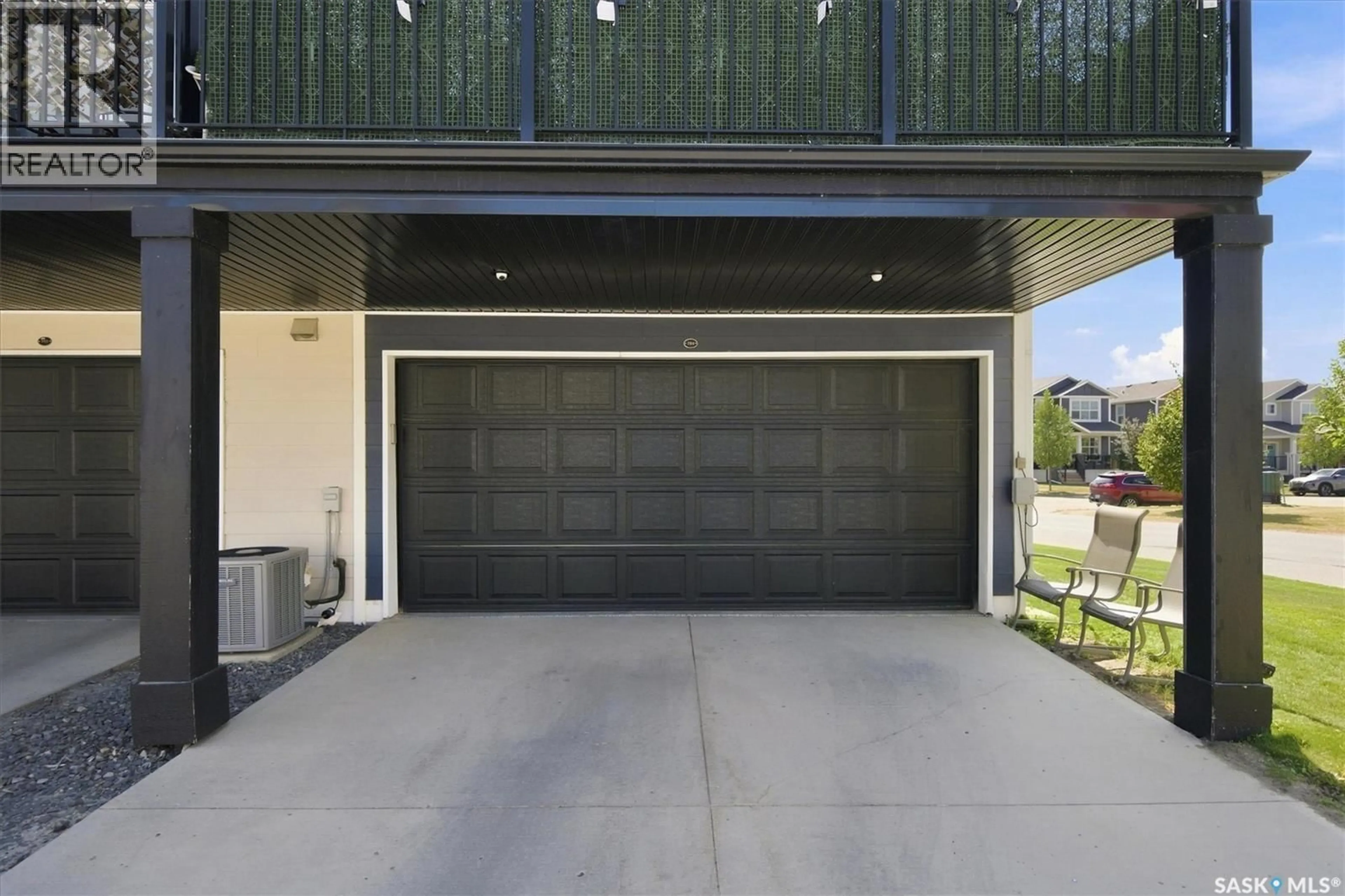 Indoor garage for 703 MEADOWS BOULEVARD, Saskatoon Saskatchewan S7V0L3