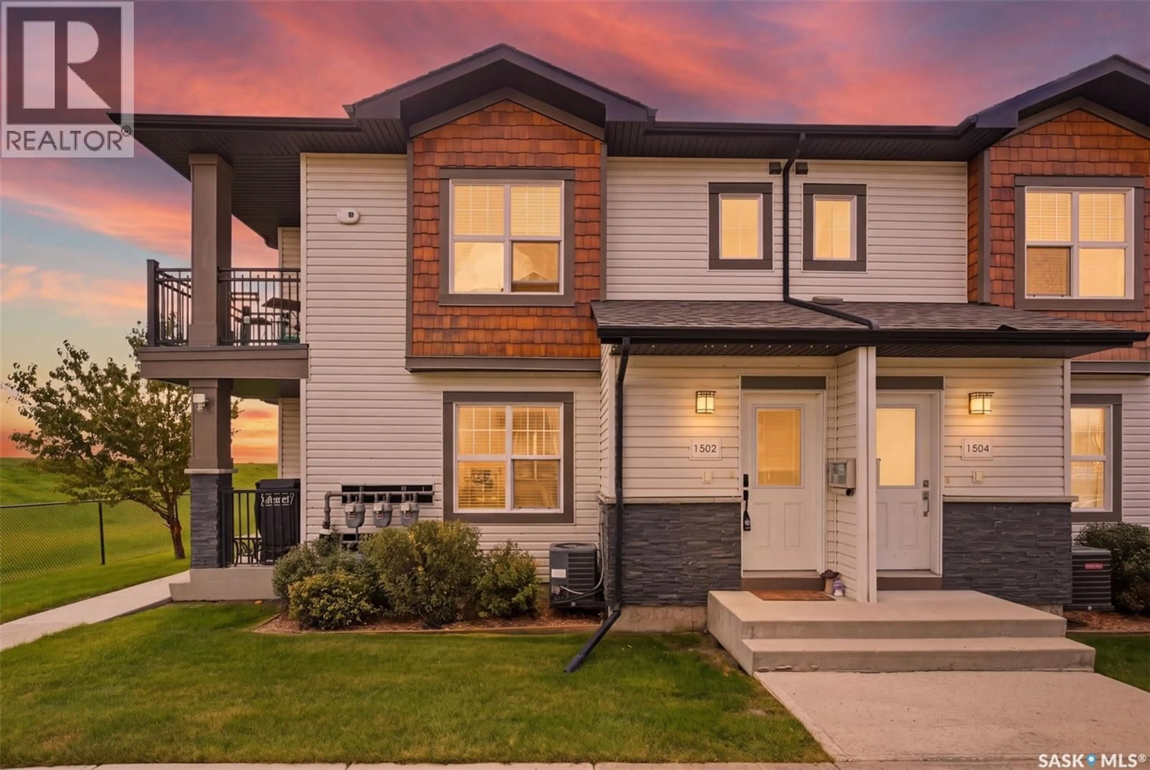 Home with vinyl exterior material, street for 1015 - 1502 PATRICK CRESCENT, Saskatoon Saskatchewan S7W0M6