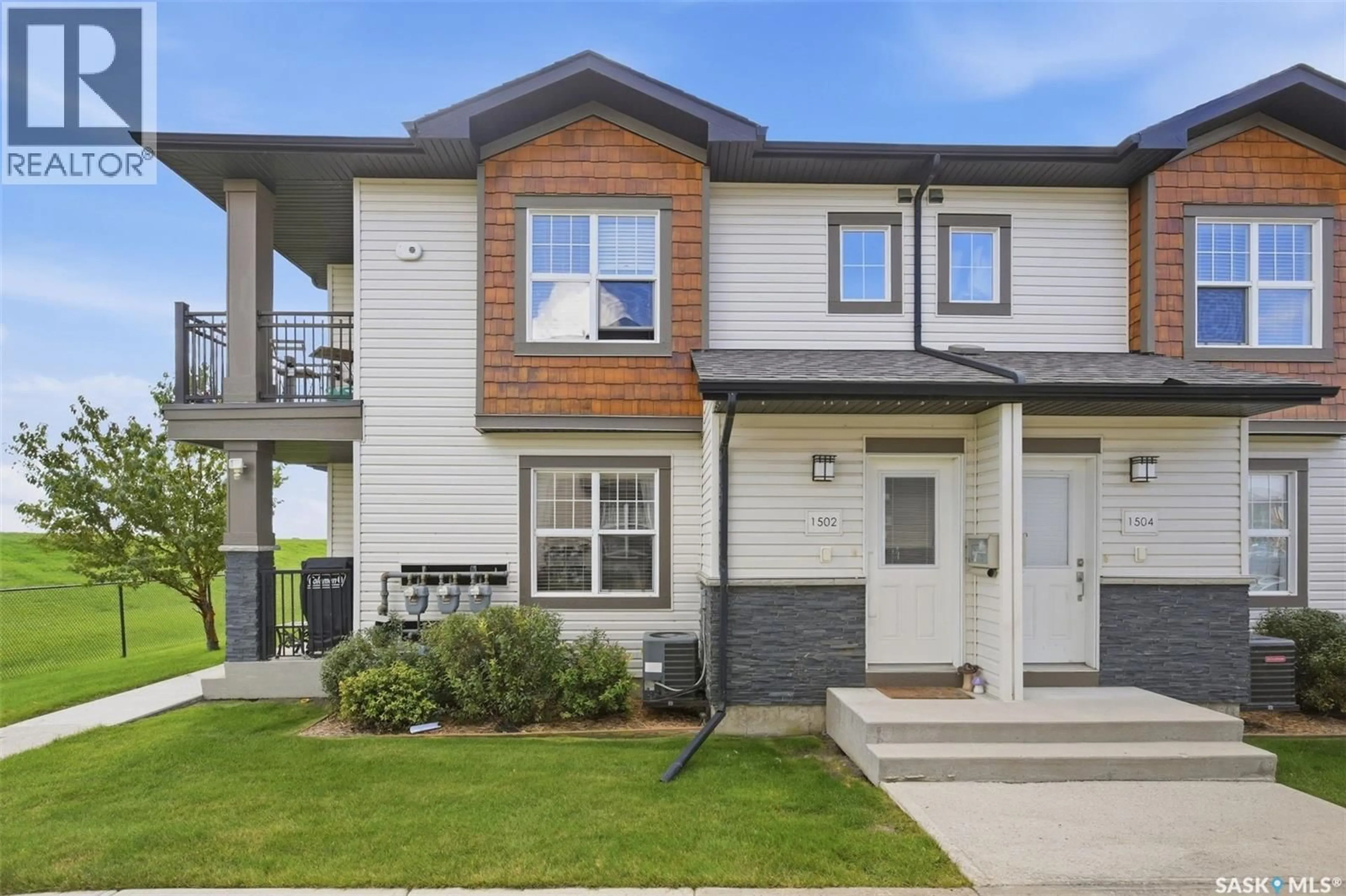 Home with vinyl exterior material, street for 1015 - 1502 PATRICK CRESCENT, Saskatoon Saskatchewan S7W0M6