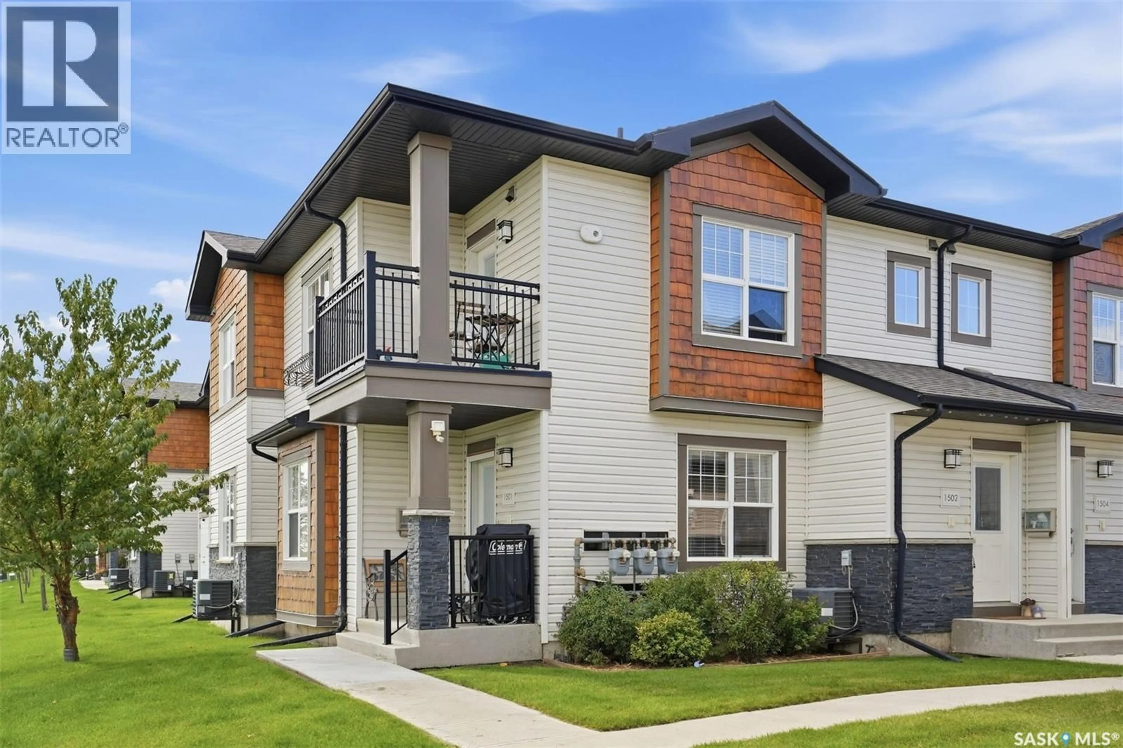 Home with vinyl exterior material, street for 1015 - 1502 PATRICK CRESCENT, Saskatoon Saskatchewan S7W0M6