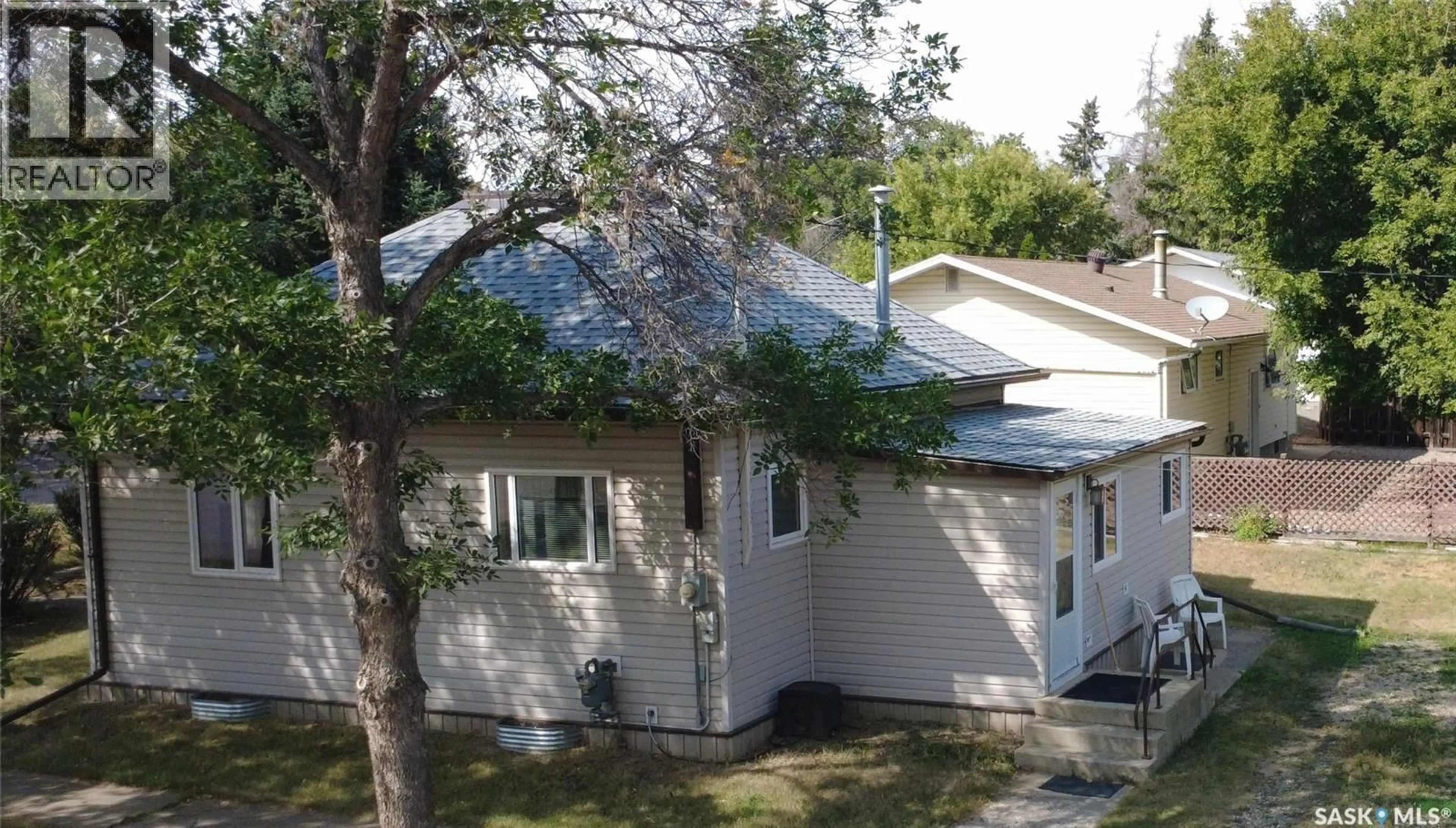 Home with vinyl exterior material, street for 503 LEONARD STREET, Herbert Saskatchewan S0H2A0