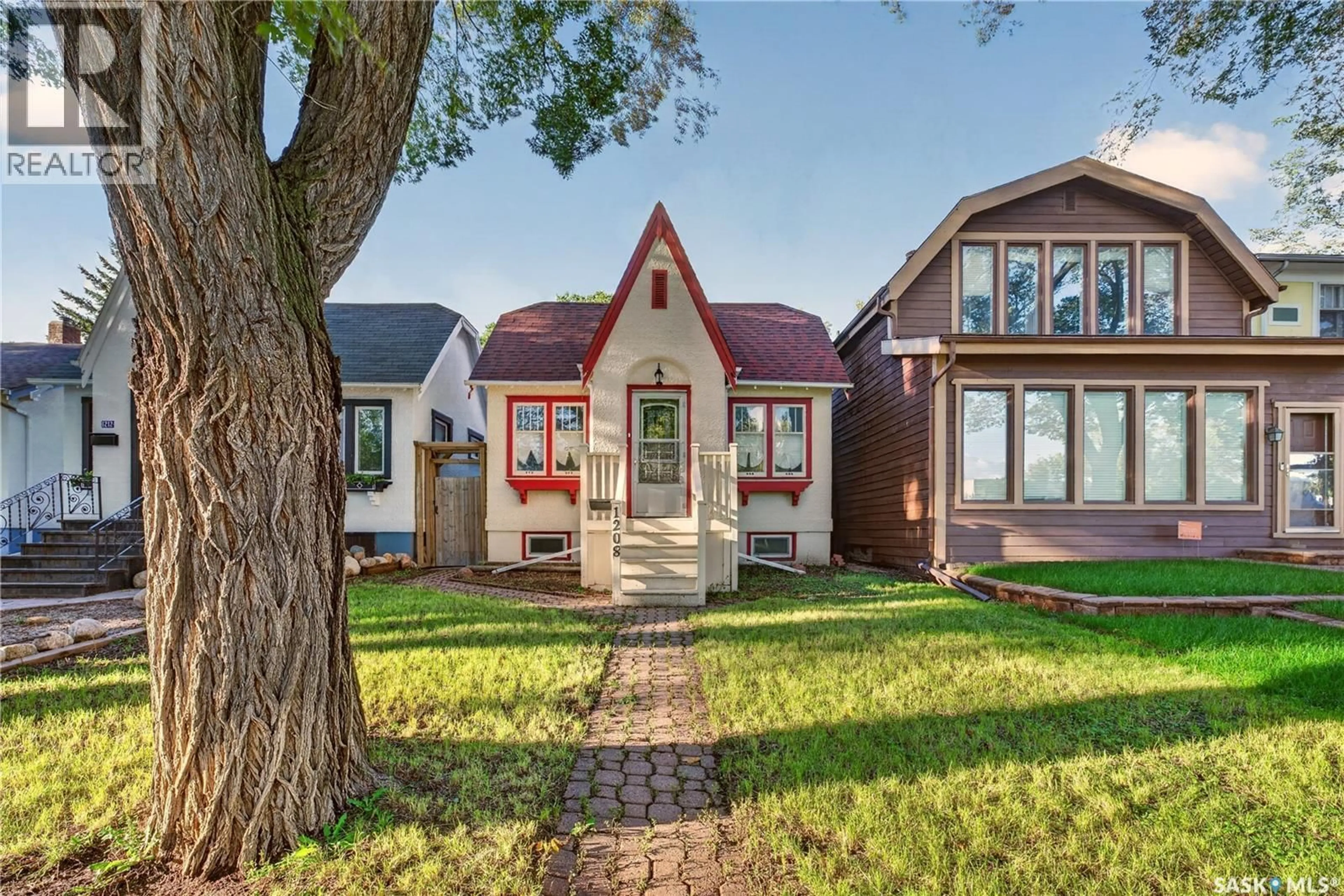 Home with vinyl exterior material, street for 1208 COLLEGE AVENUE, Regina Saskatchewan S4P1A9