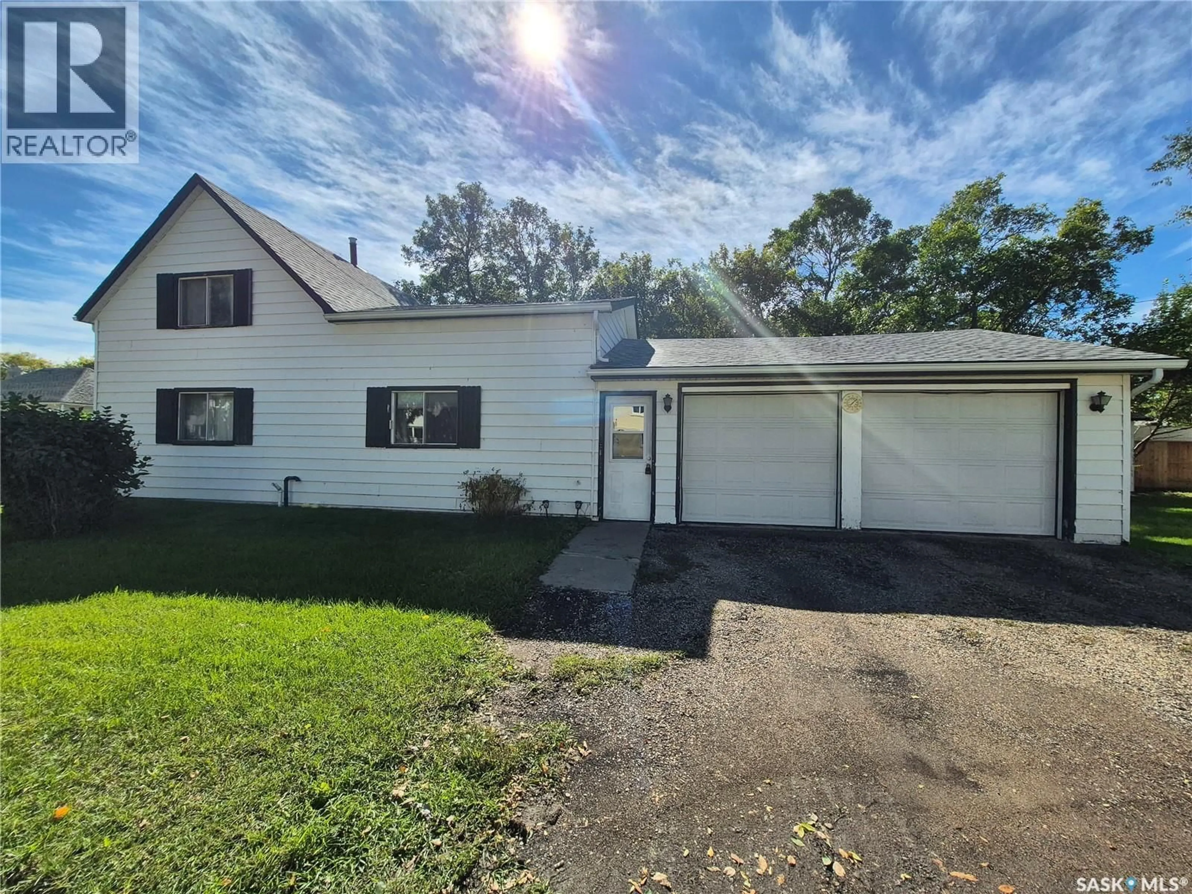 A pic from outside/outdoor area/front of a property/back of a property/a pic from drone, unknown for 239 9TH STREET, Weyburn Saskatchewan S4H1E9