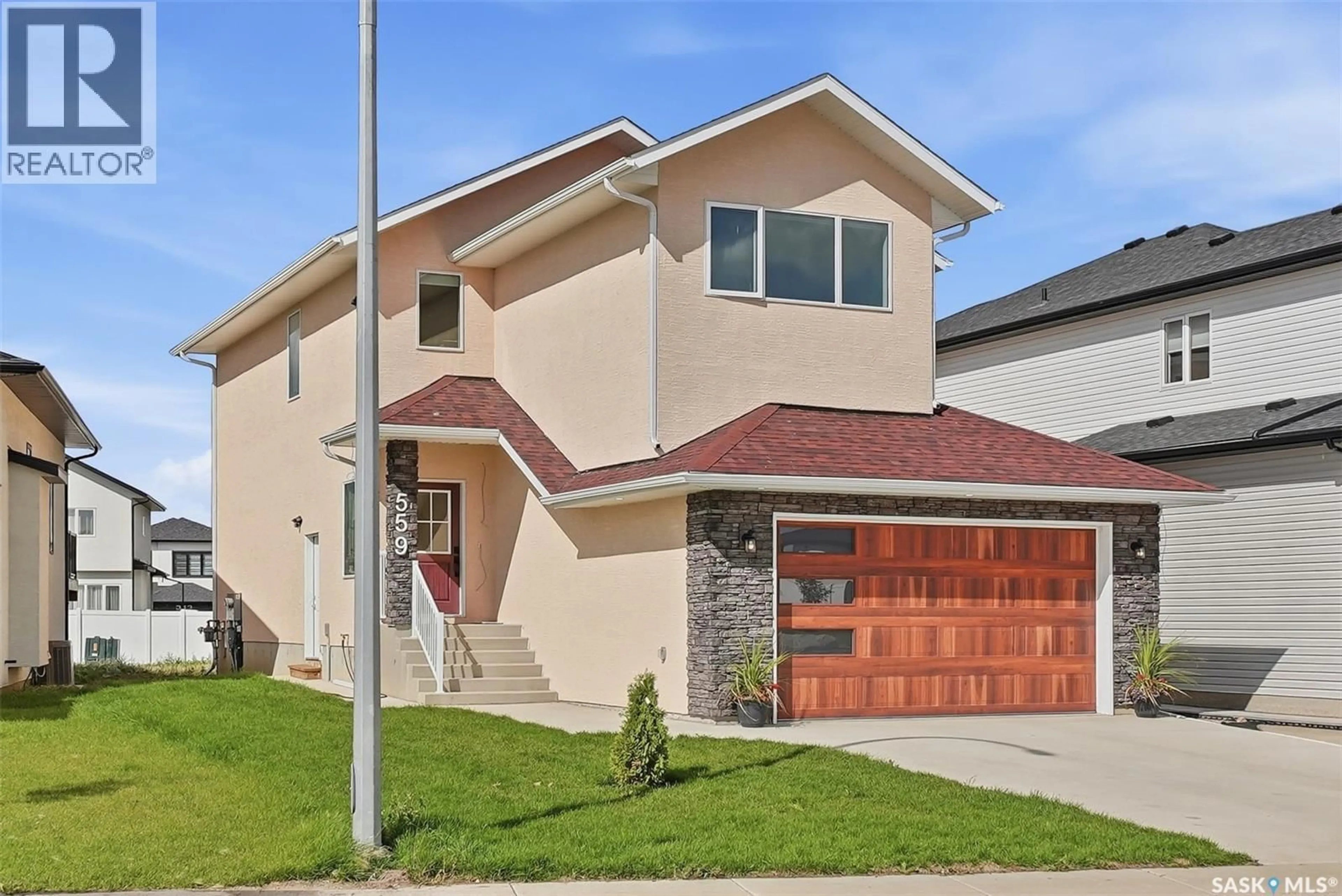 Home with brick exterior material, street for 559 KALRA STREET, Saskatoon Saskatchewan S7W1E7