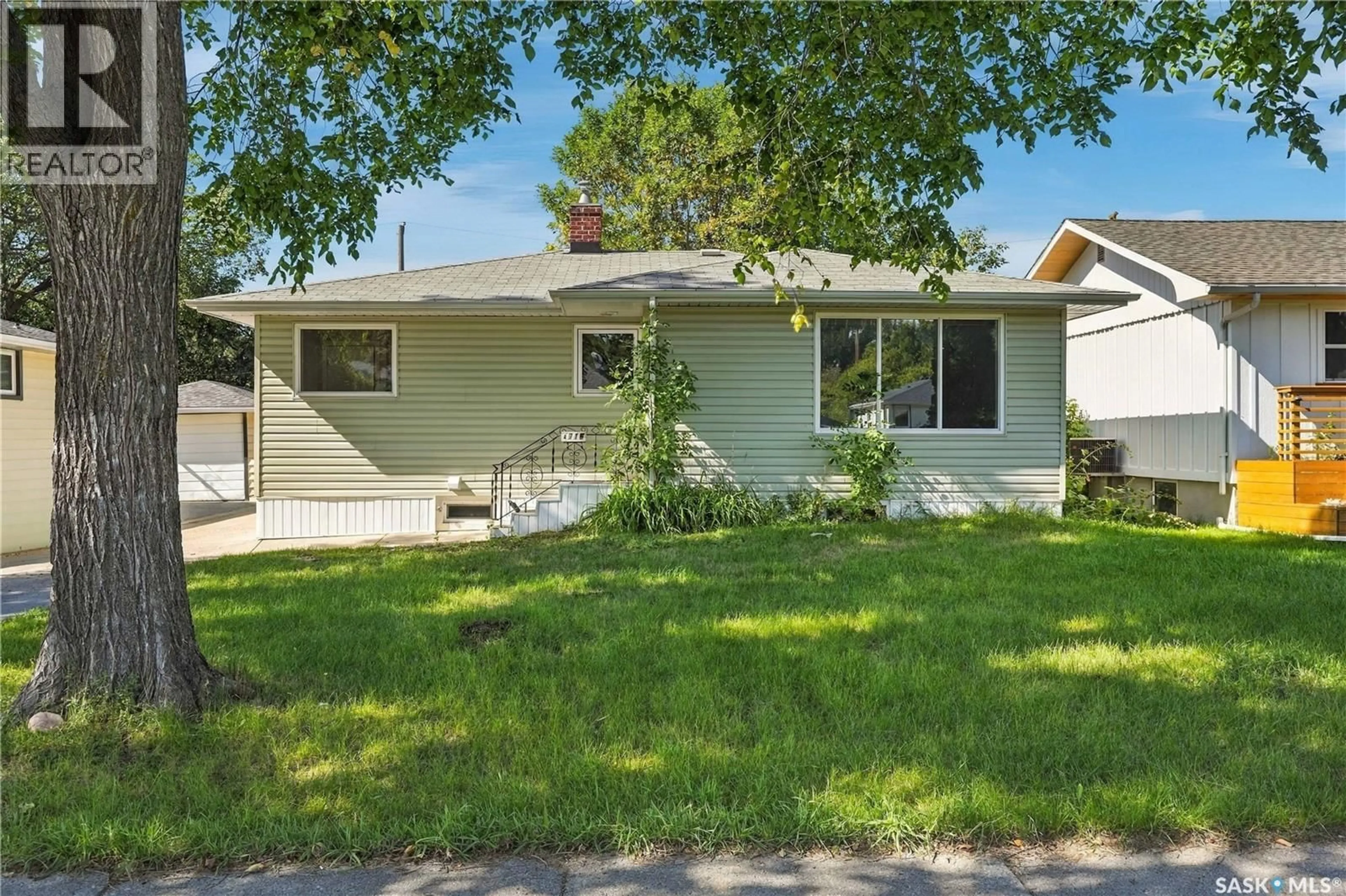 Home with vinyl exterior material, street for 2716 WINNIPEG STREET, Regina Saskatchewan S4P1H9
