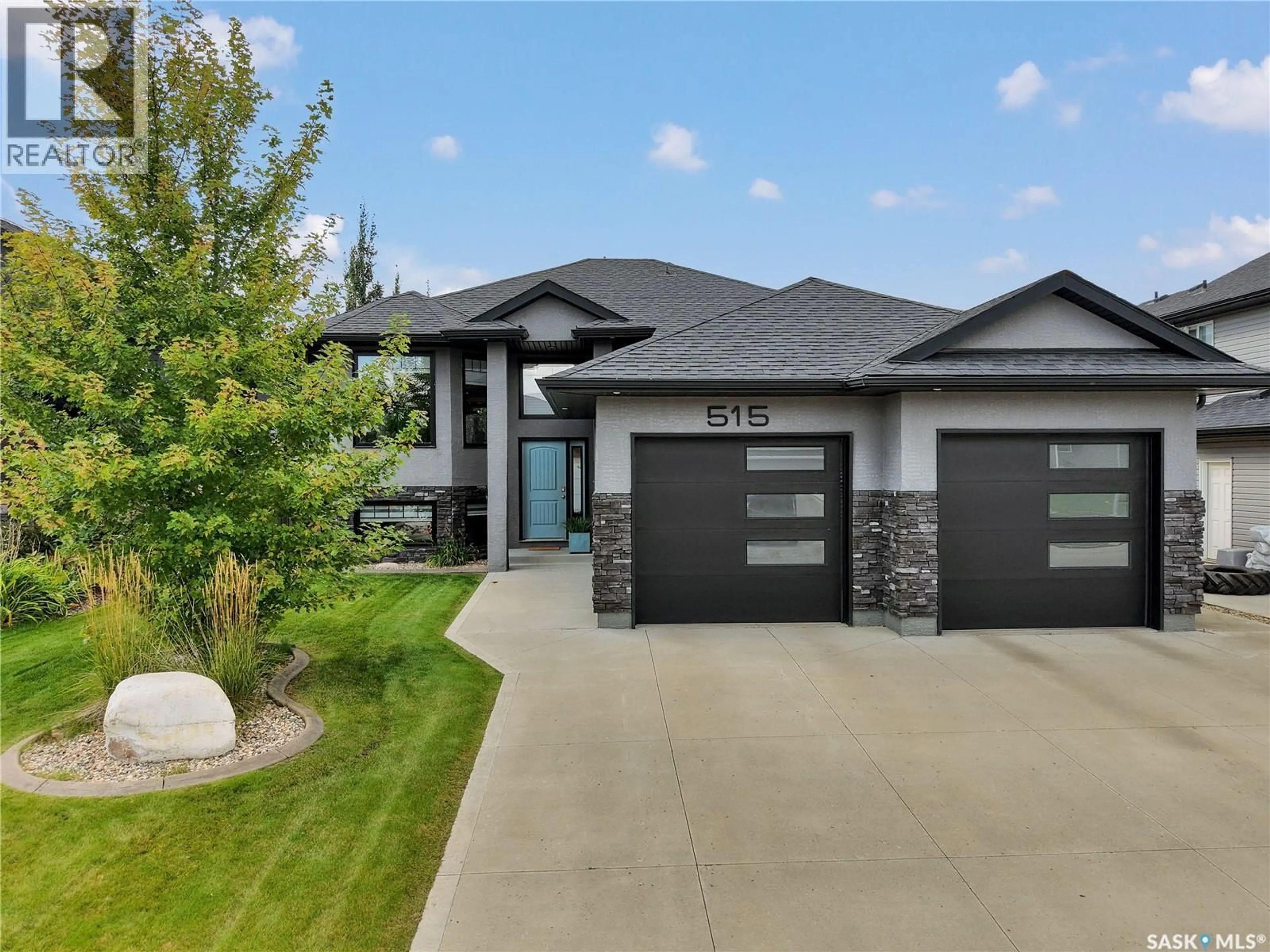 Home with brick exterior material, street for 515 COUPLES COURT, Warman Saskatchewan S0K4S1