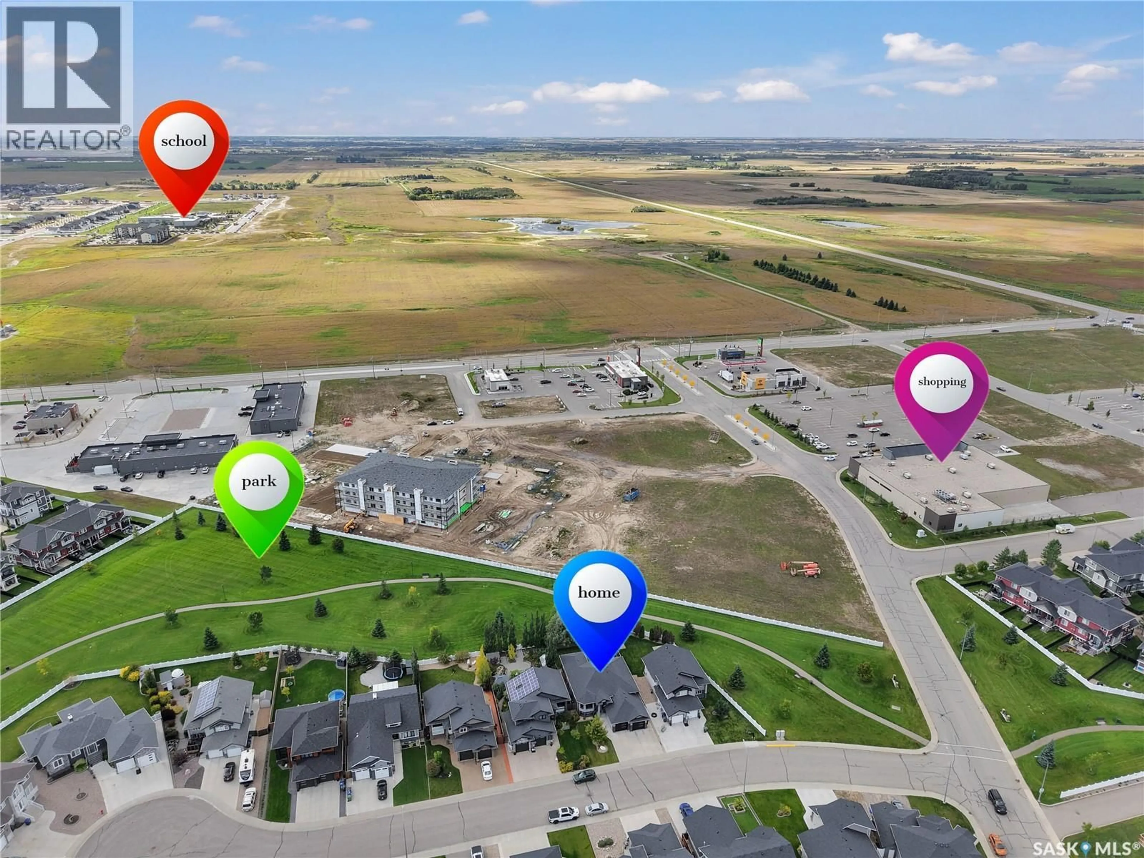 A pic from outside/outdoor area/front of a property/back of a property/a pic from drone, water/lake/river/ocean view for 515 COUPLES COURT, Warman Saskatchewan S0K4S1
