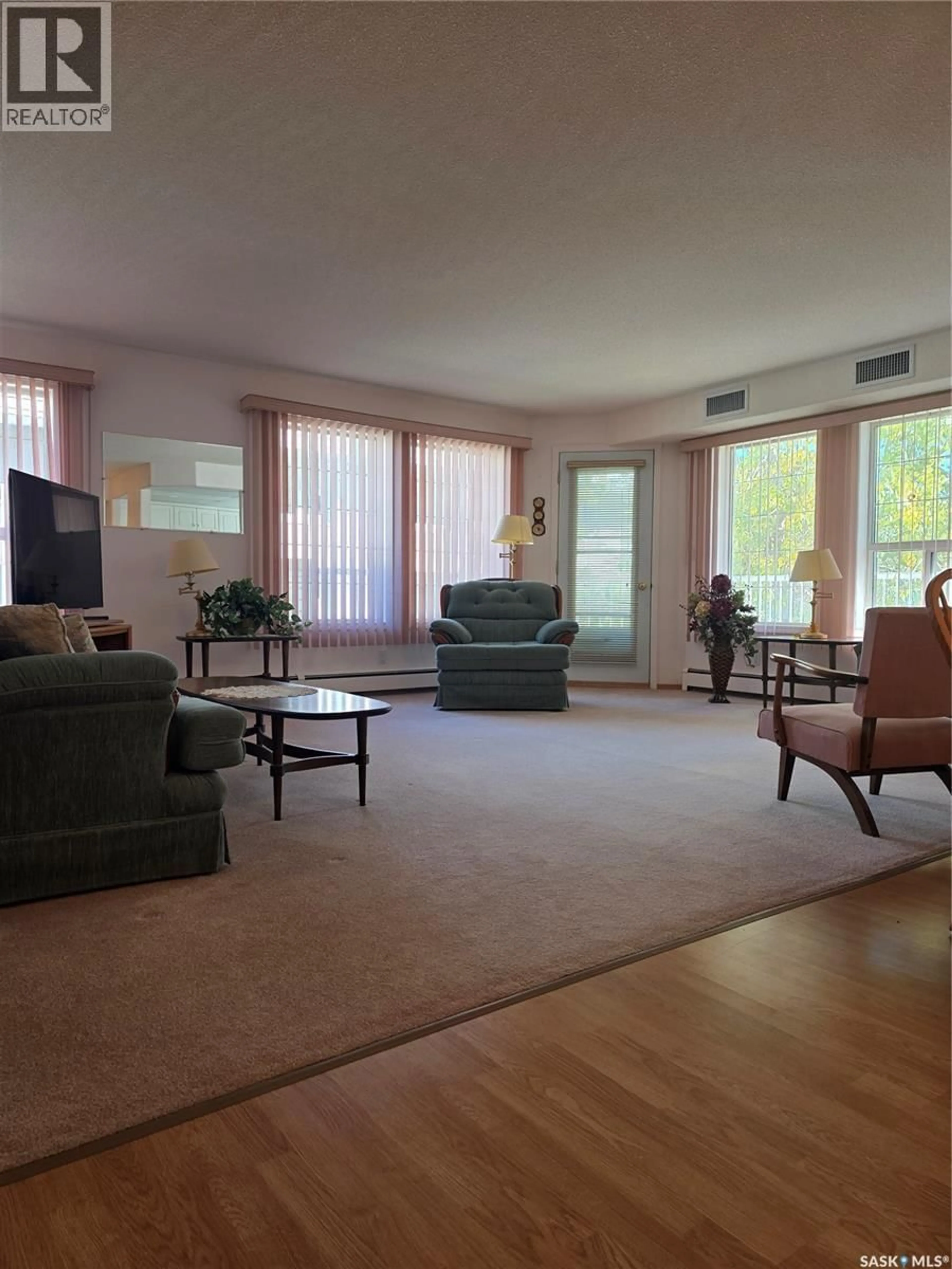 Living room with furniture, unknown for 102 - 1112 98TH STREET, Tisdale Saskatchewan S0E1T0