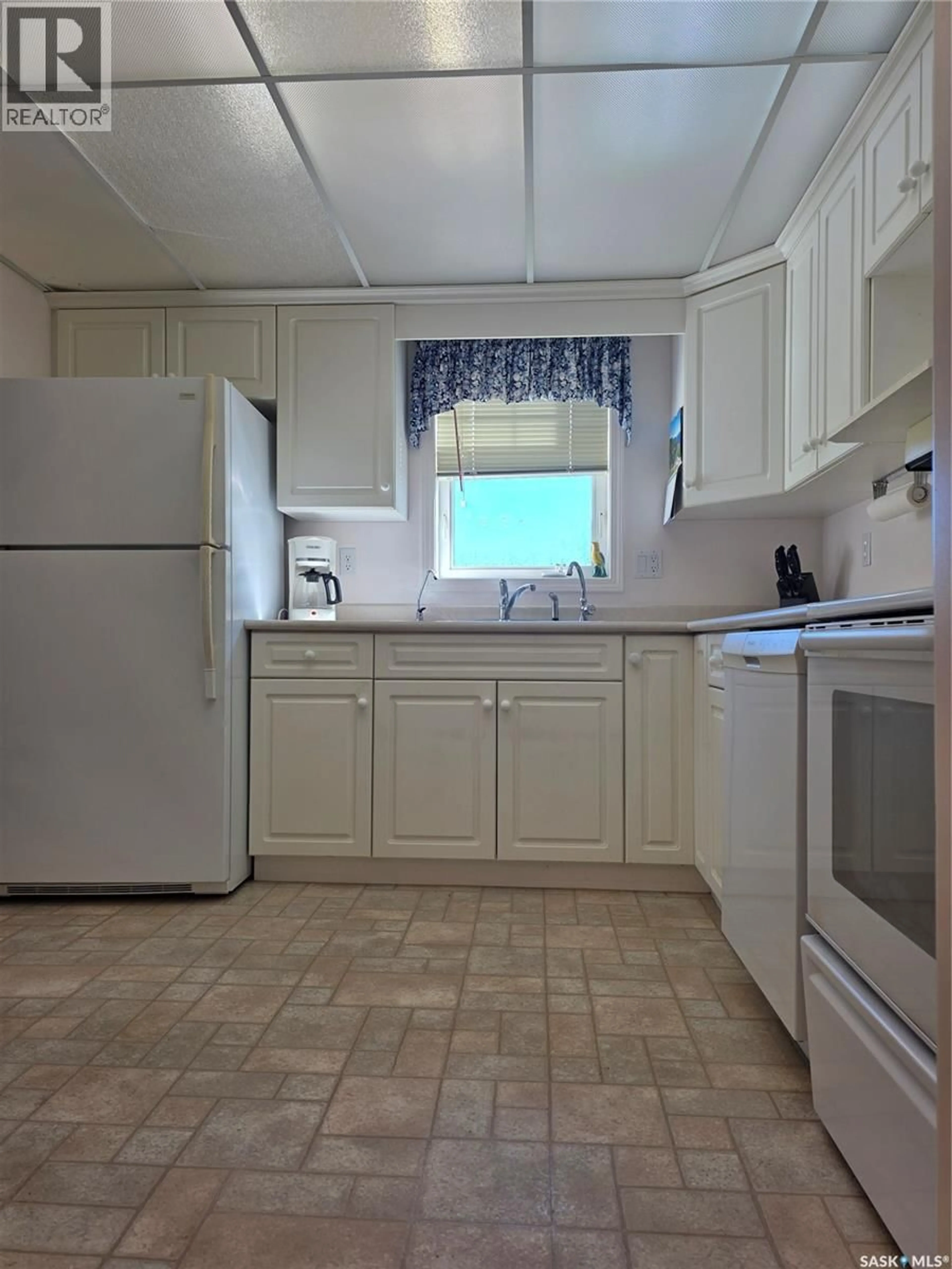 Standard kitchen, unknown for 102 - 1112 98TH STREET, Tisdale Saskatchewan S0E1T0