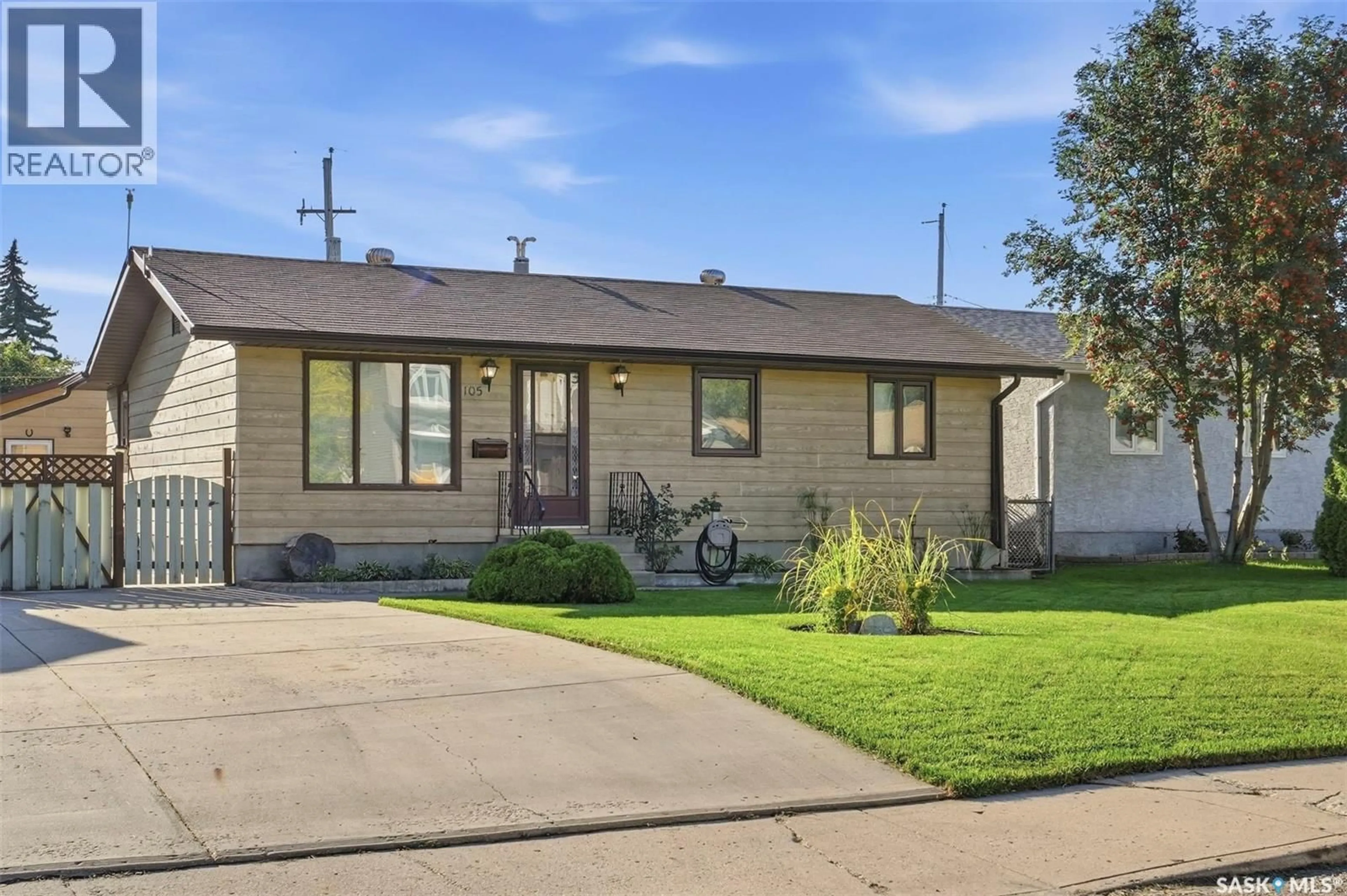 Home with vinyl exterior material, street for 105 FITZGERALD STREET, Saskatoon Saskatchewan S7N2A6