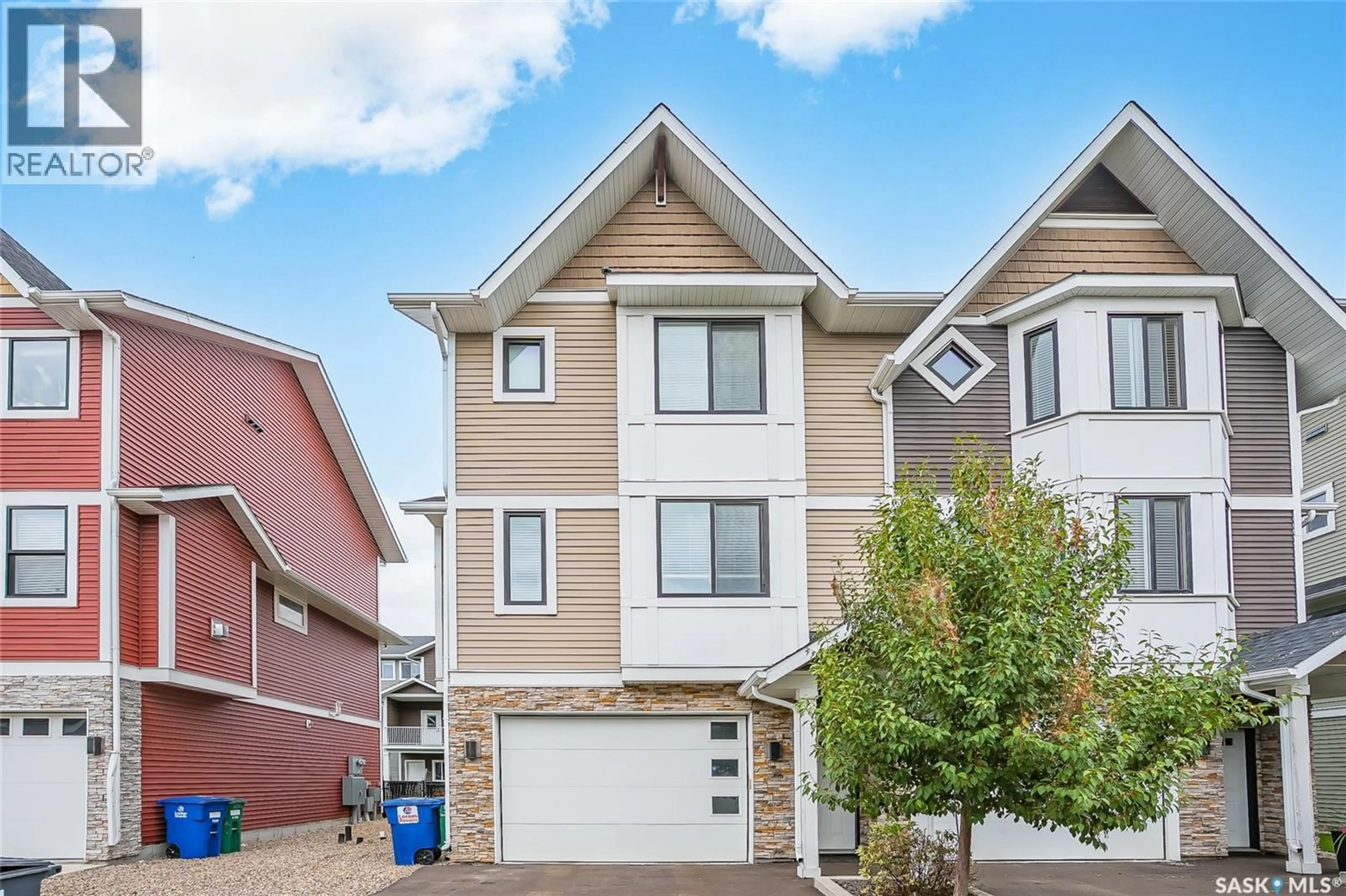 Home with vinyl exterior material, street for W - 212 3220 11TH STREET, Saskatoon Saskatchewan S7M5M4