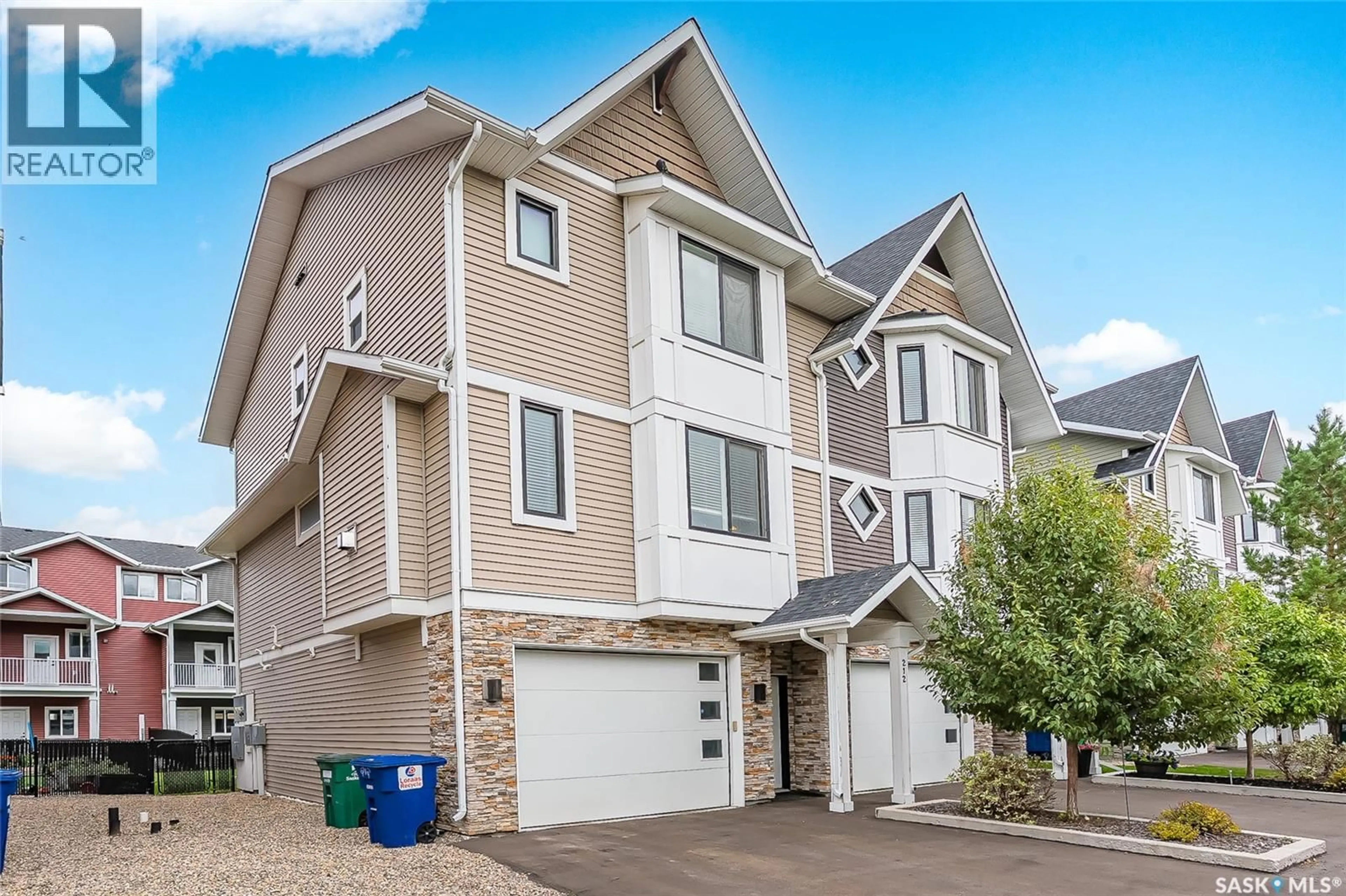Home with vinyl exterior material, street for W - 212 3220 11TH STREET, Saskatoon Saskatchewan S7M5M4