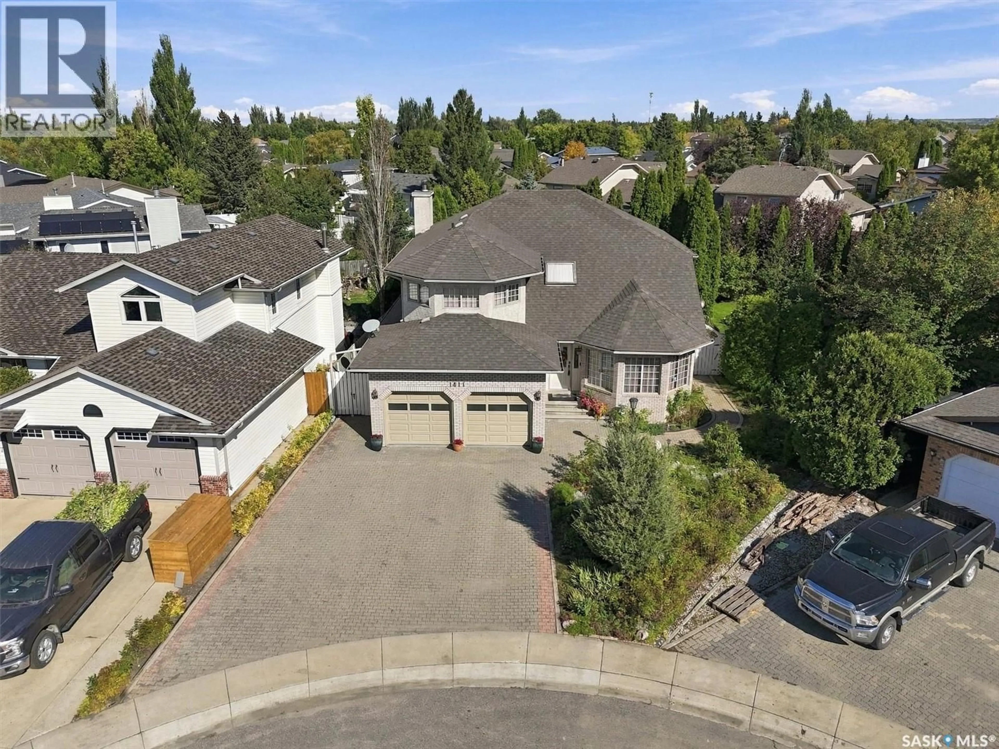 A pic from outside/outdoor area/front of a property/back of a property/a pic from drone, street for 1411 HASLAM PLACE, Saskatoon Saskatchewan S7S1G2