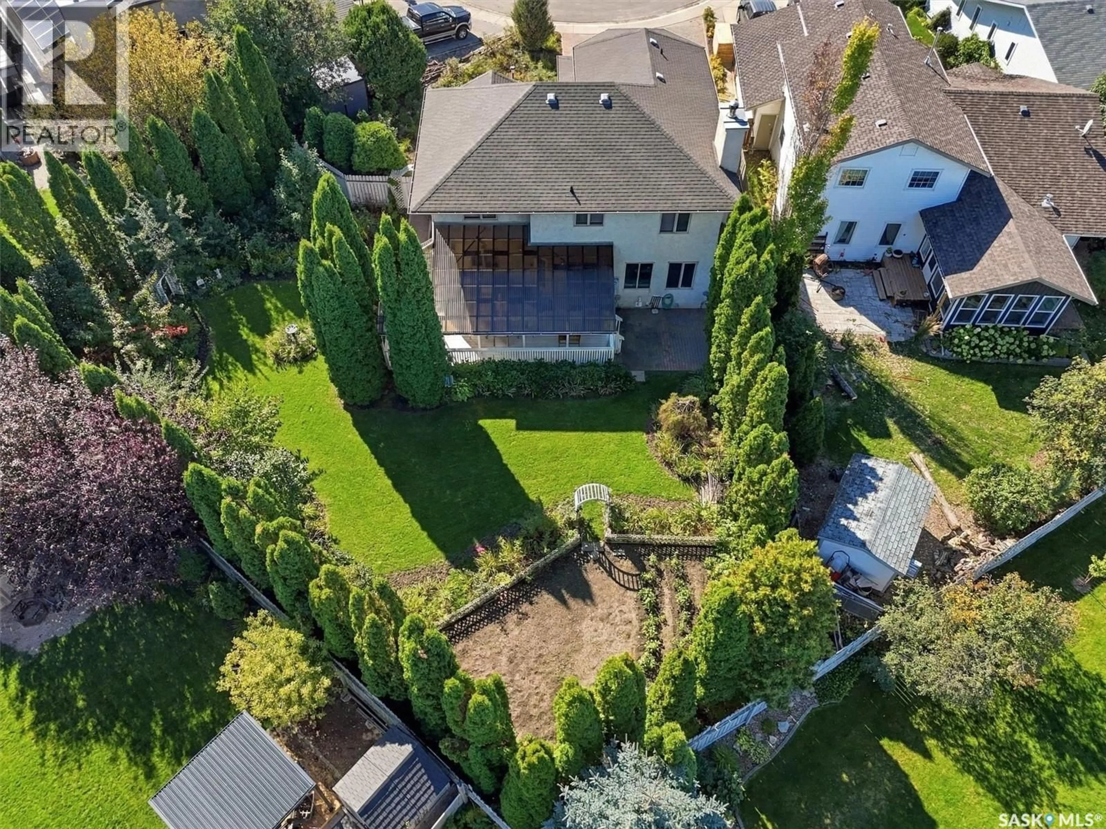 A pic from outside/outdoor area/front of a property/back of a property/a pic from drone, street for 1411 HASLAM PLACE, Saskatoon Saskatchewan S7S1G2