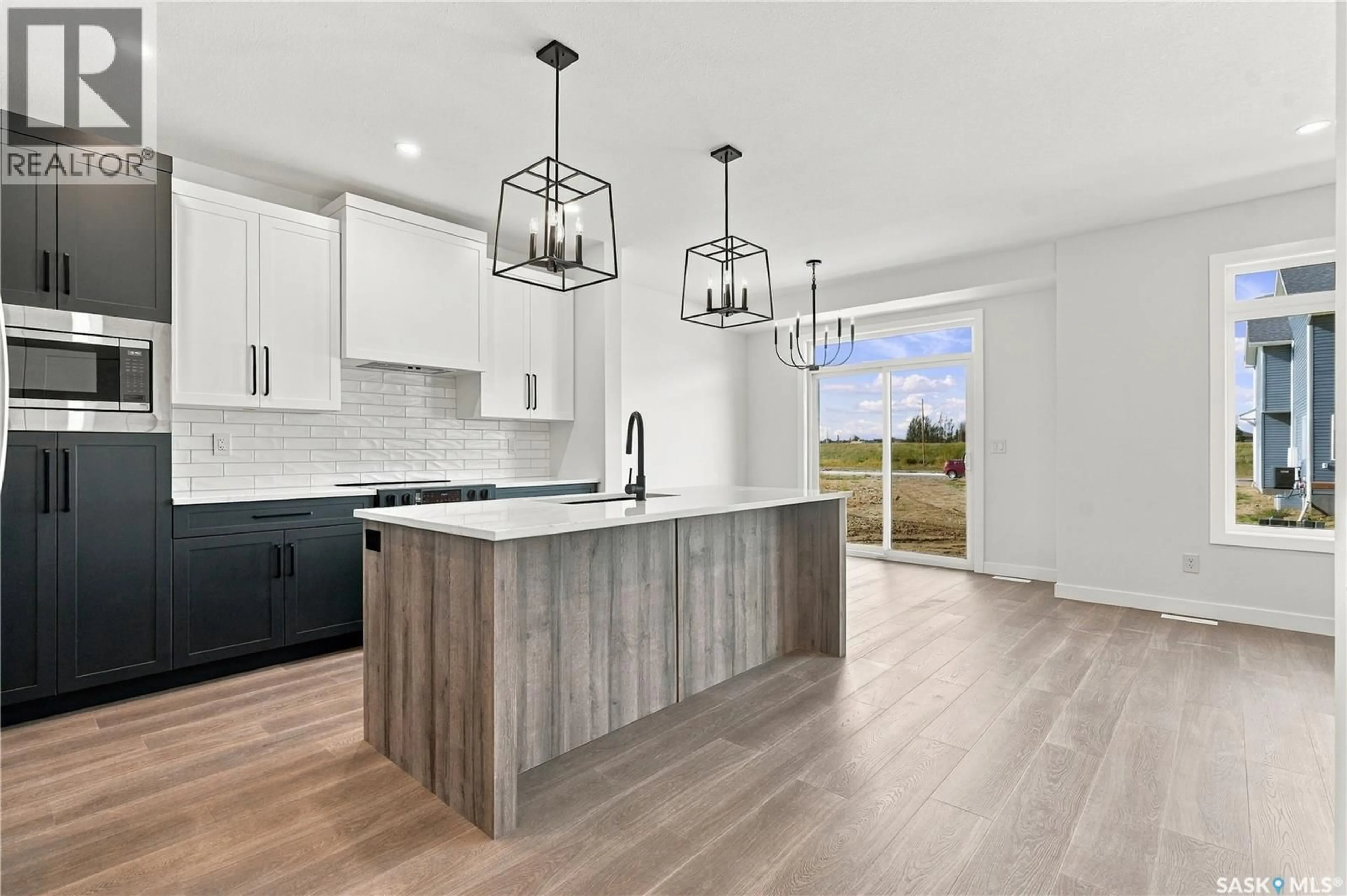 Open concept kitchen, unknown for 251 DORAN WAY, Saskatoon Saskatchewan S7V0Z7