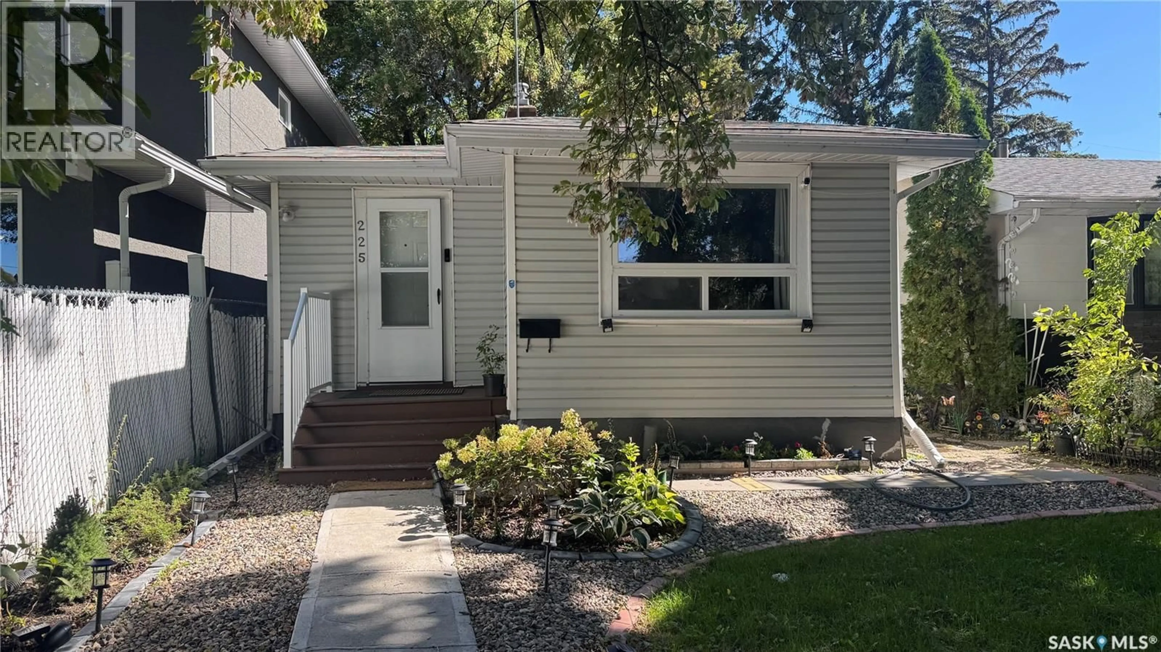 Home with vinyl exterior material, street for 225 TORONTO STREET, Regina Saskatchewan S4R1M1
