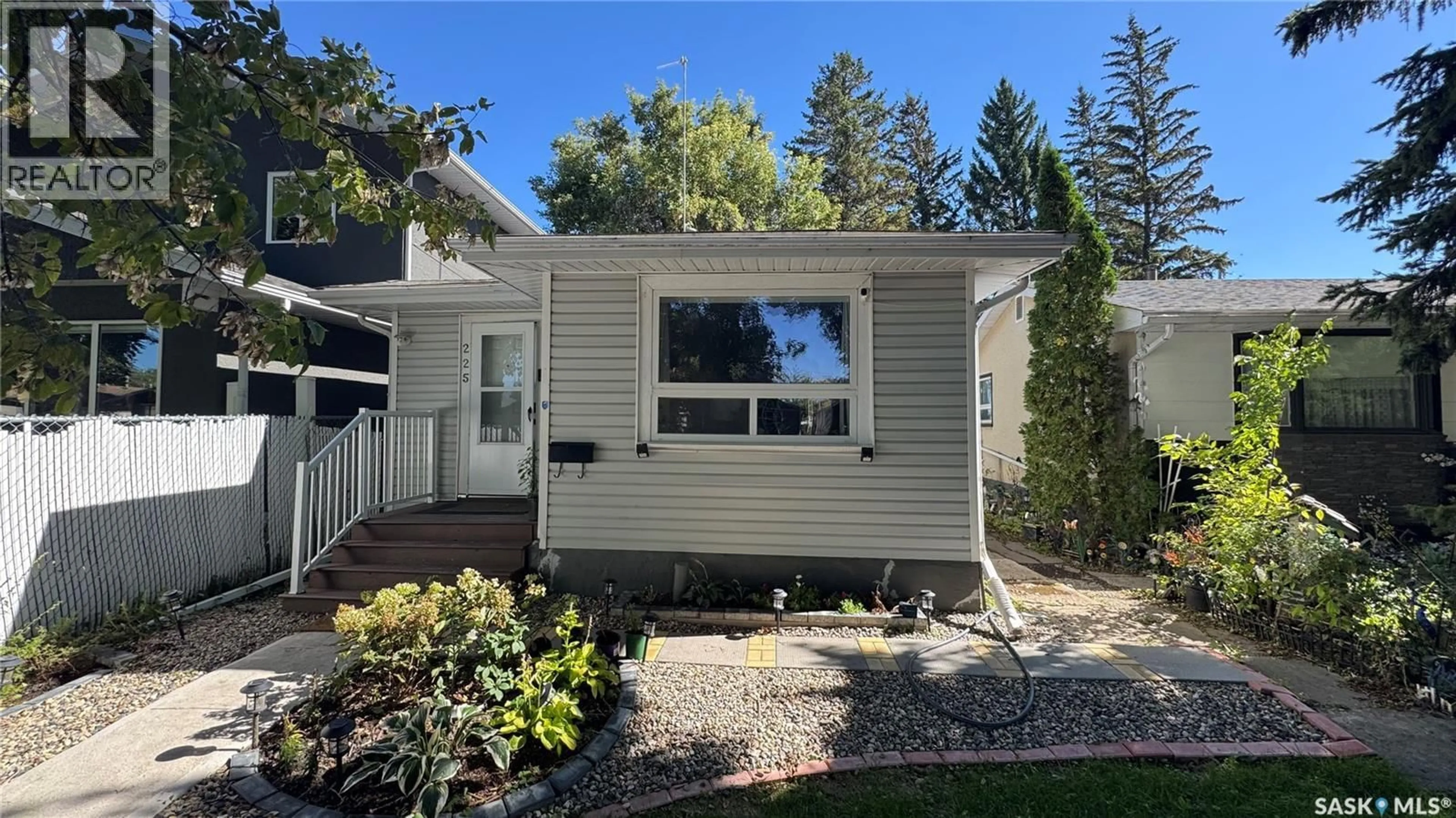 Home with vinyl exterior material, street for 225 TORONTO STREET, Regina Saskatchewan S4R1M1