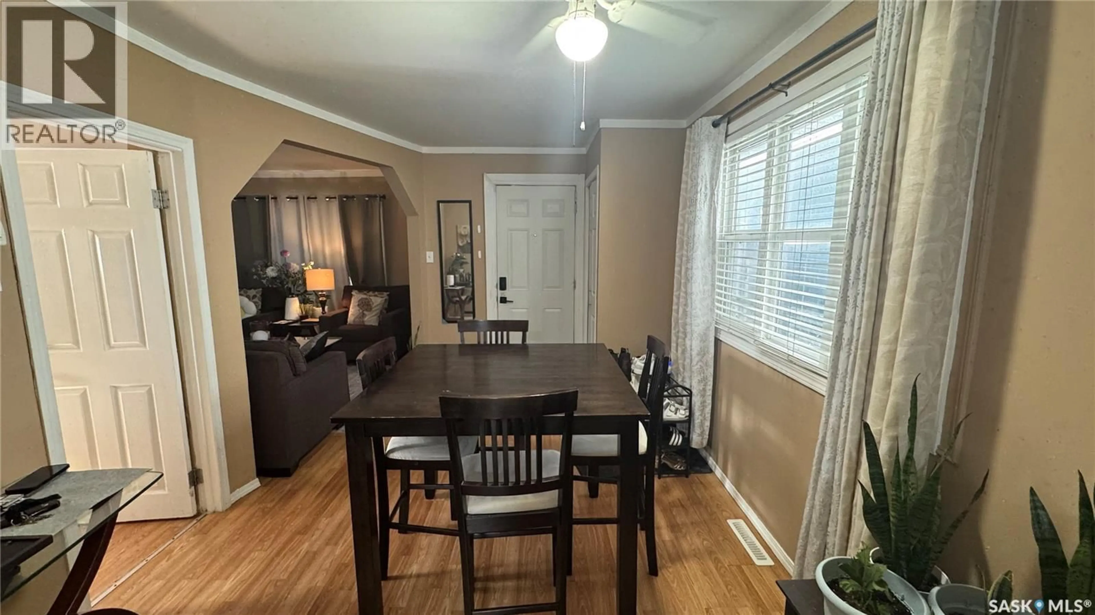 Dining room, wood/laminate floor for 225 TORONTO STREET, Regina Saskatchewan S4R1M1