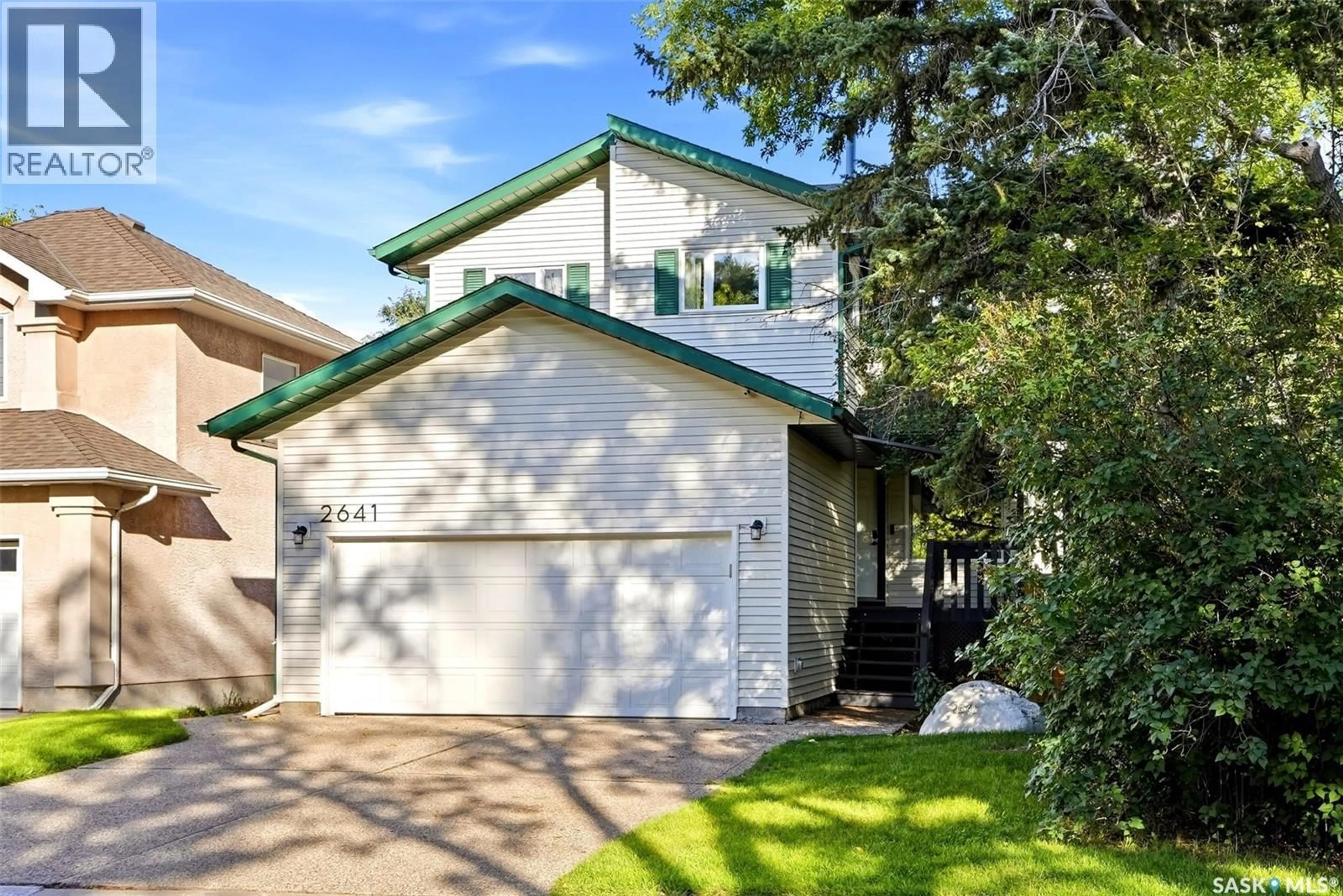 Home with vinyl exterior material, street for 2641 GARNET STREET, Regina Saskatchewan S4T3A8