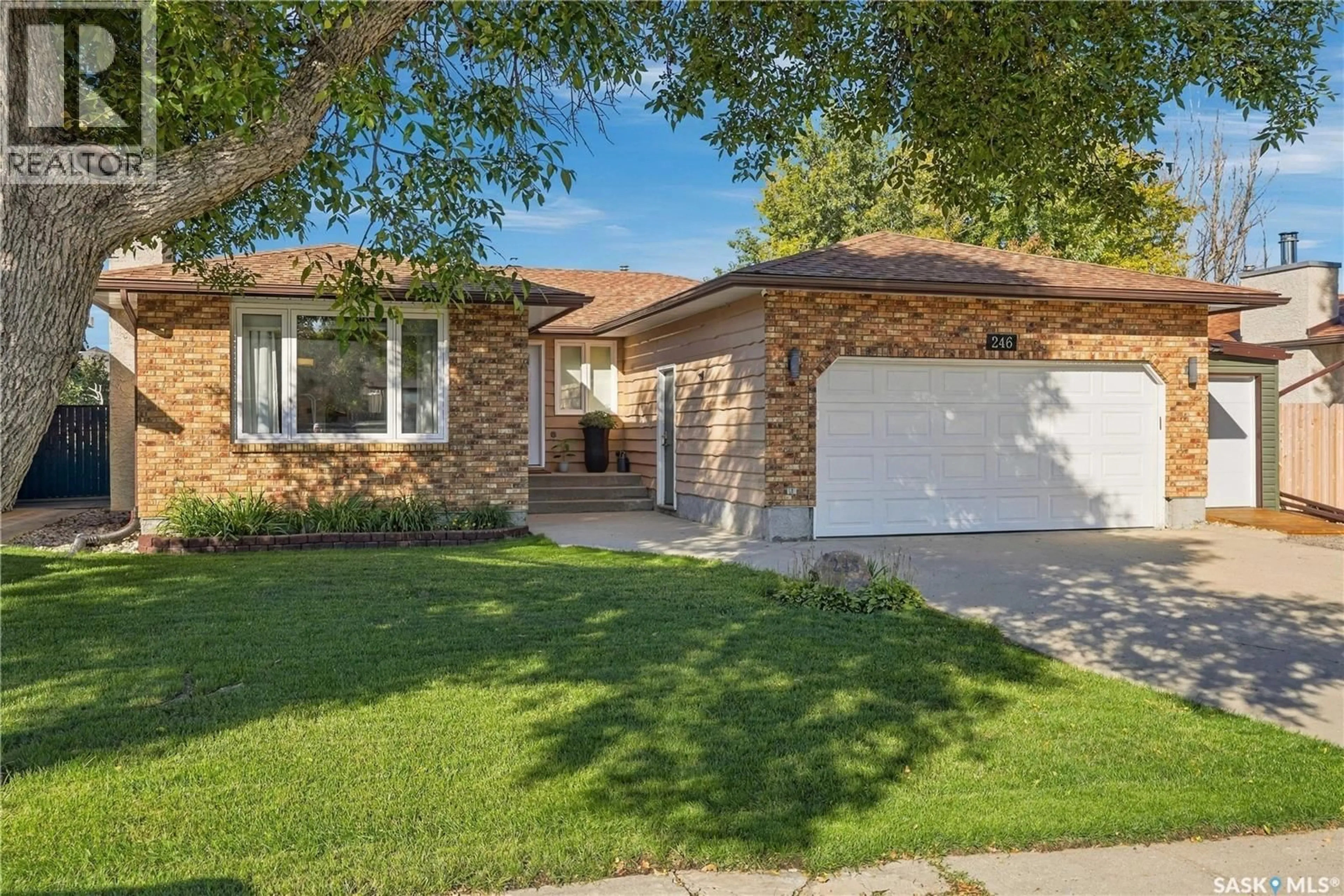 Home with vinyl exterior material, street for 246 HANSEN DRIVE, Regina Saskatchewan S4X2Y6