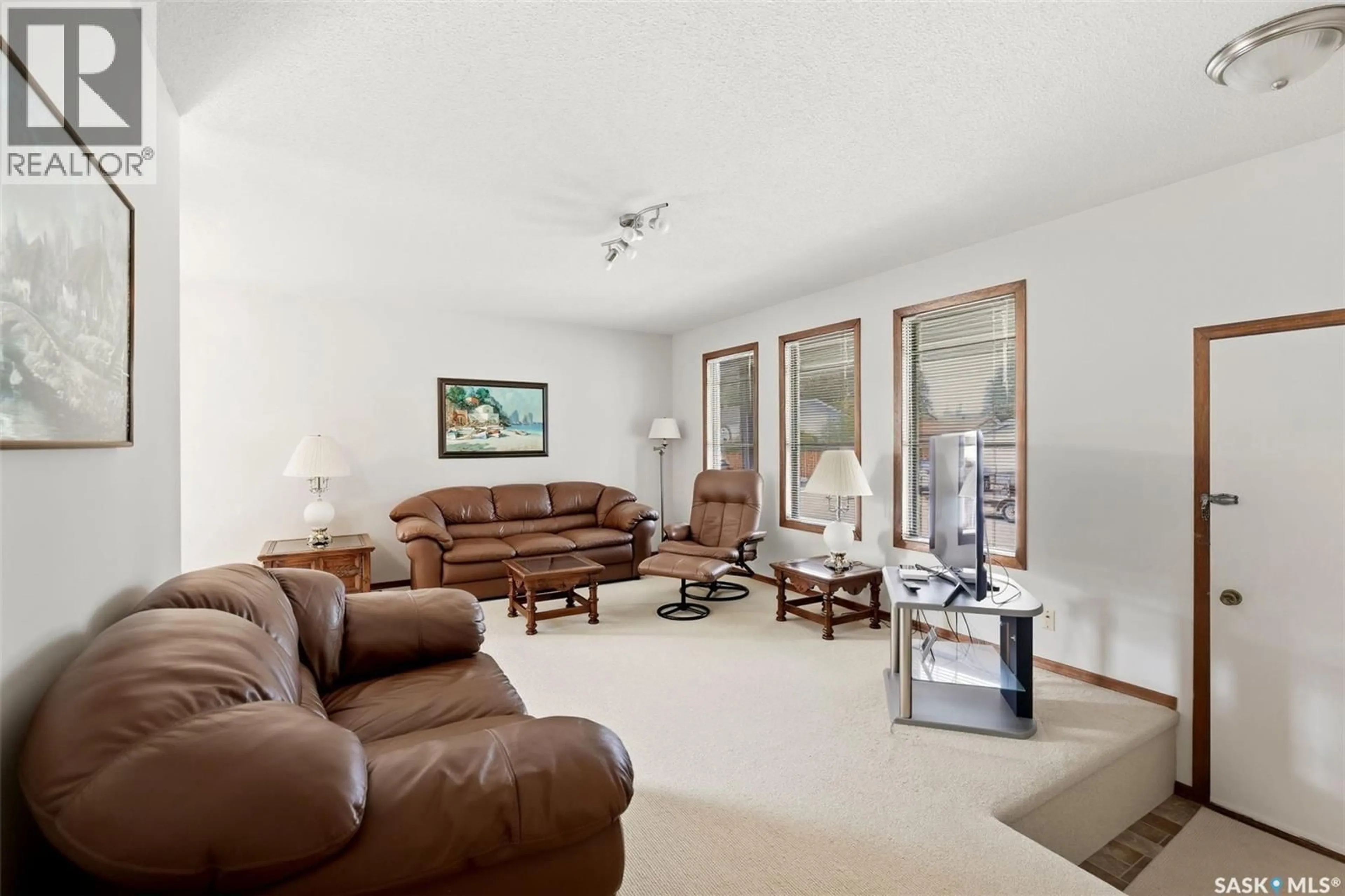 Living room with furniture, unknown for 199 MCSHERRY CRESCENT, Regina Saskatchewan S4T7B6