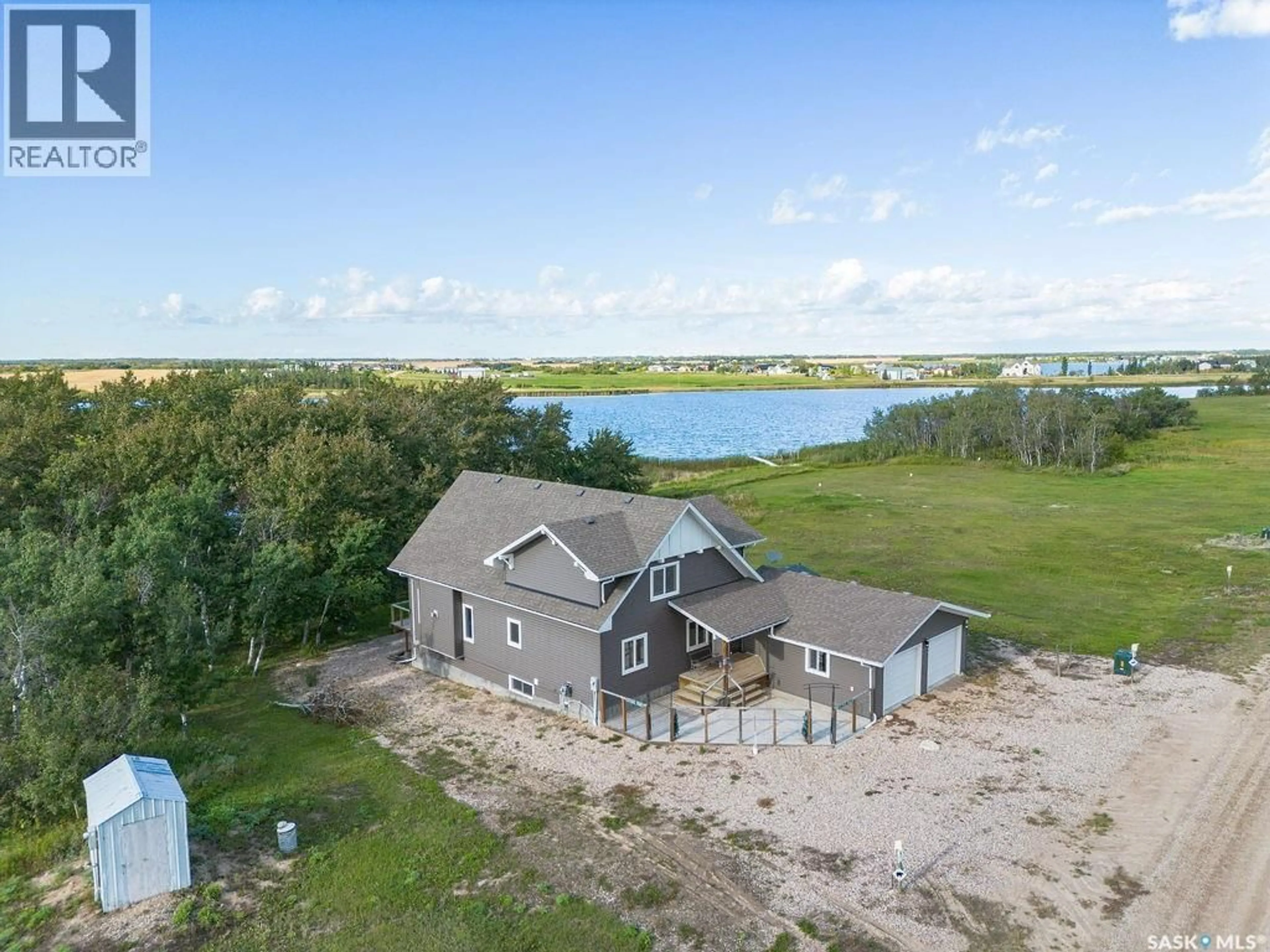 A pic from outside/outdoor area/front of a property/back of a property/a pic from drone, water/lake/river/ocean view for 1&2 PELICAN LANE, Humboldt Lake Saskatchewan S0K2A0