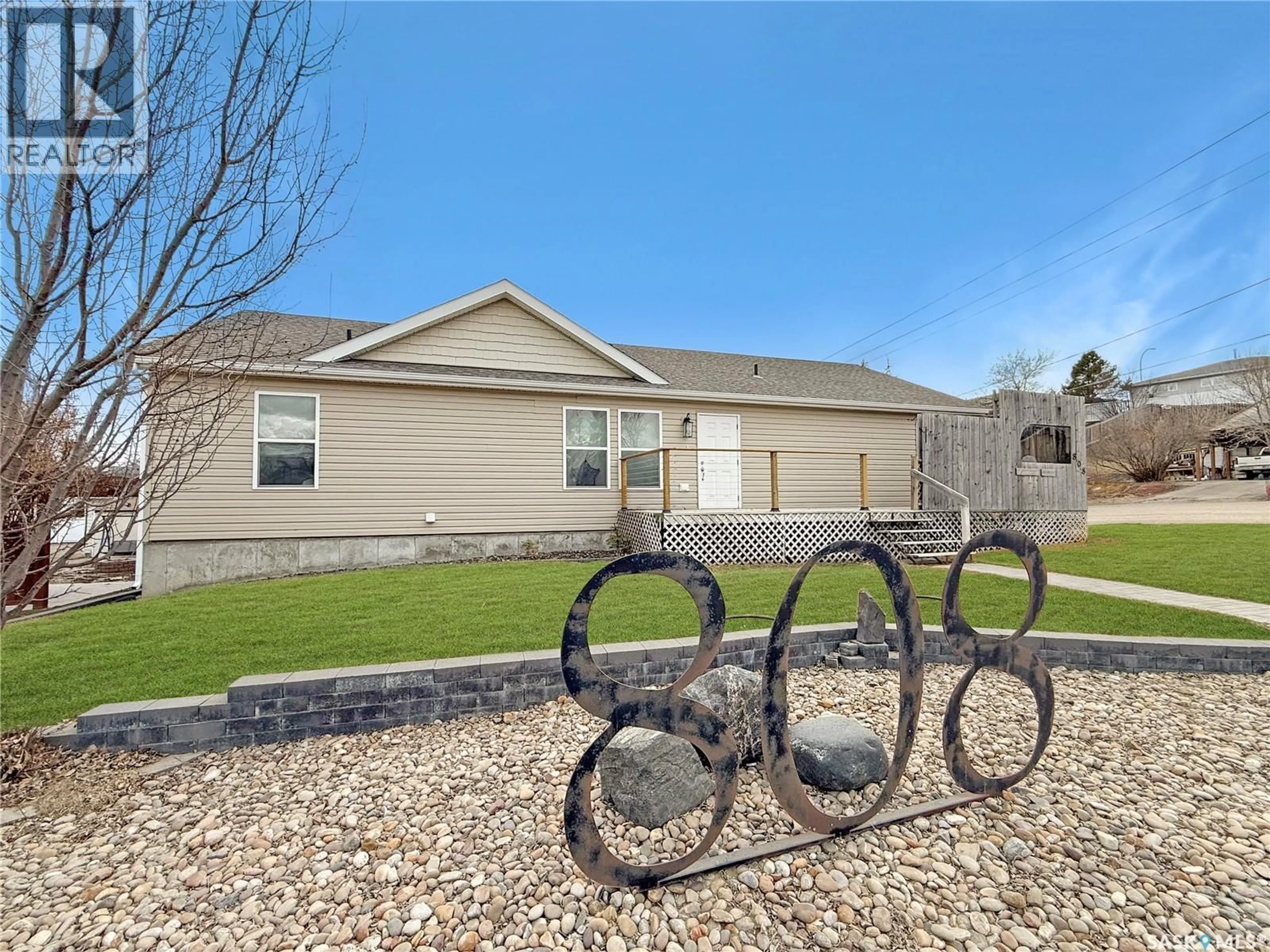 Home with vinyl exterior material, street for 808 CHAPLIN STREET, Swift Current Saskatchewan S9H1J5