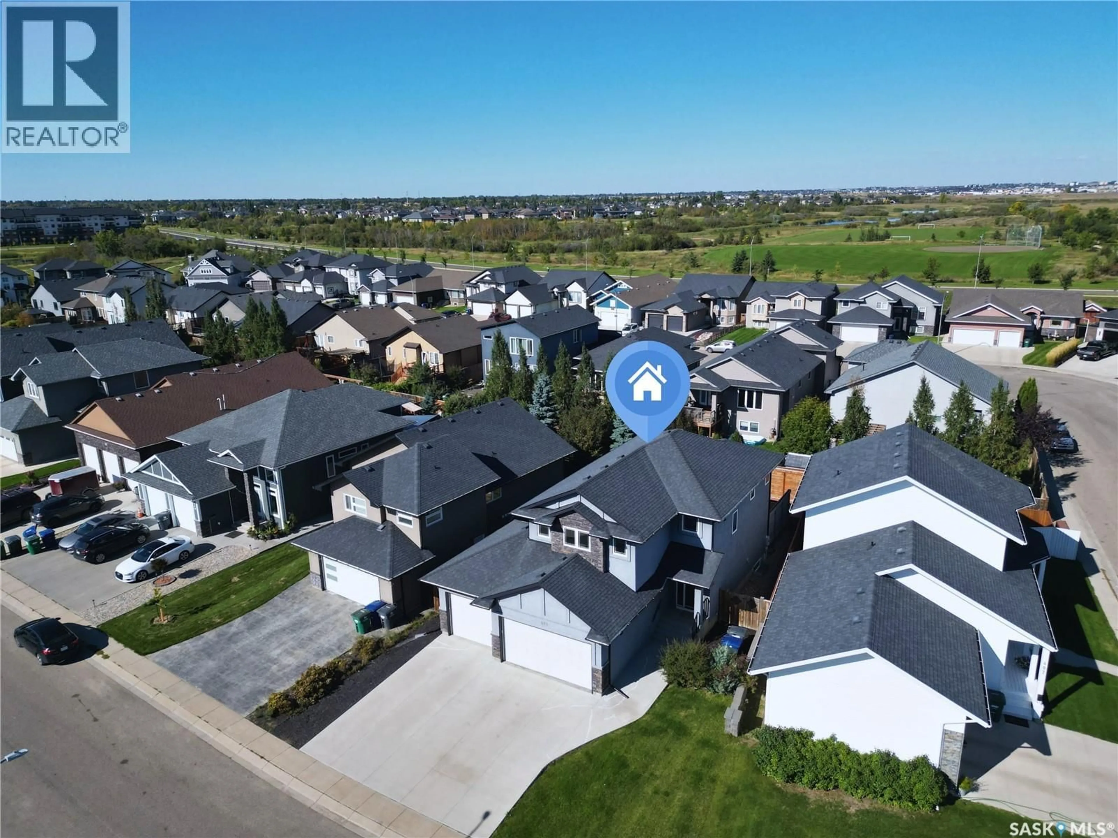 A pic from outside/outdoor area/front of a property/back of a property/a pic from drone, street for 411 HASTINGS CRESCENT, Saskatoon Saskatchewan S7V0C7