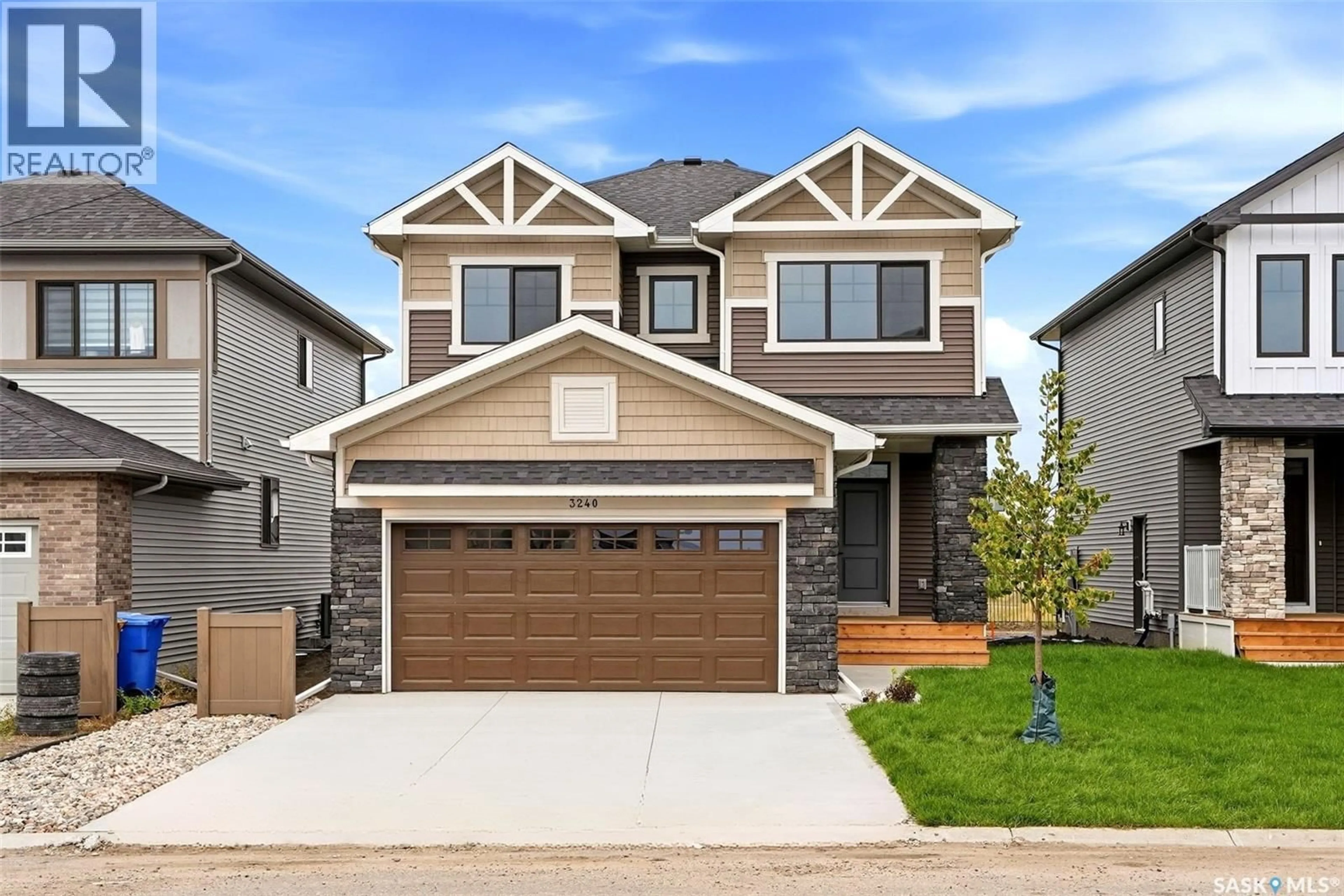 Home with vinyl exterior material, street for 3240 FAVEL DRIVE, Regina Saskatchewan S4V4B3