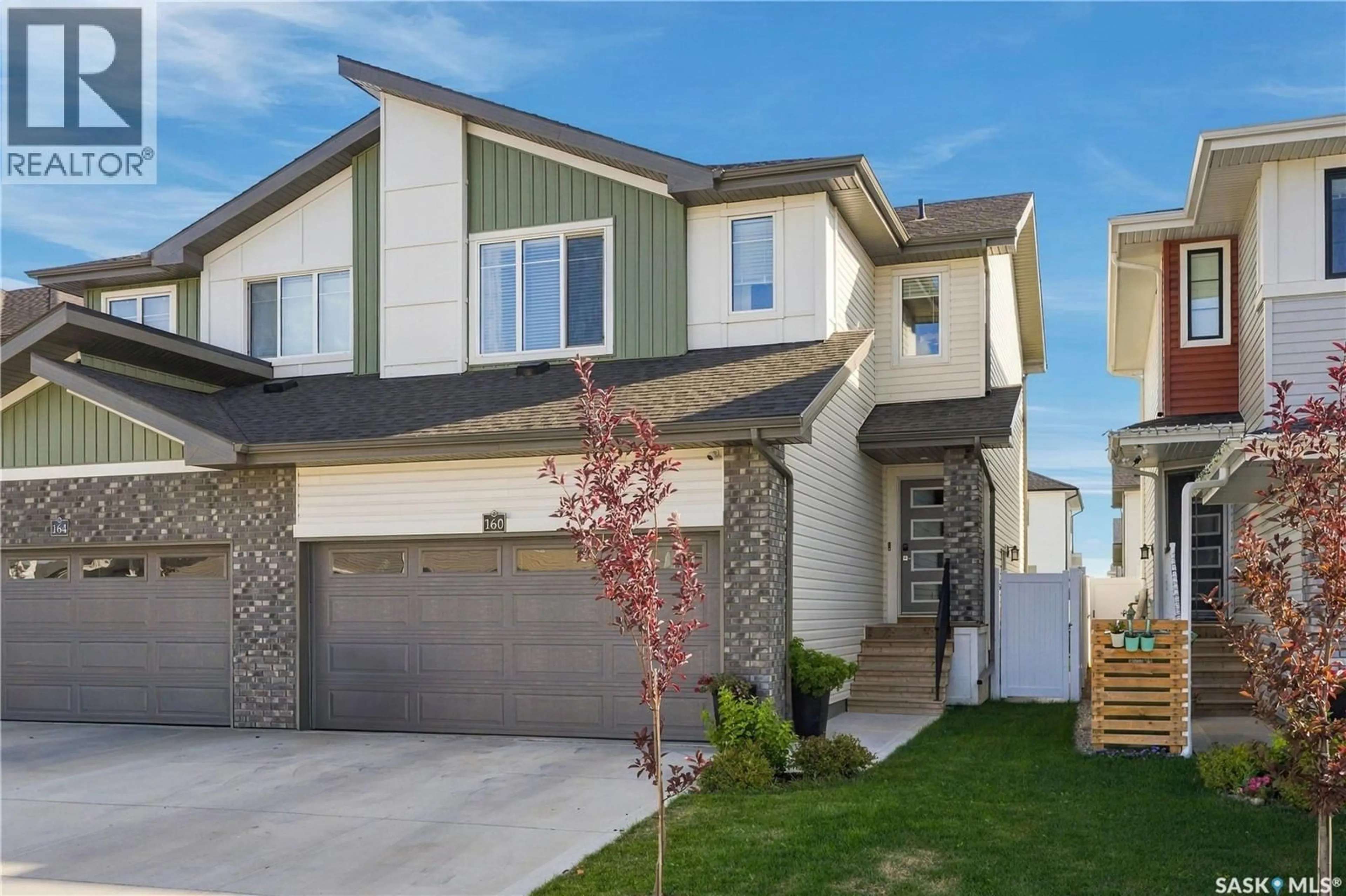Home with vinyl exterior material, street for 160 TUFTS WAY, Saskatoon Saskatchewan S7V1P4