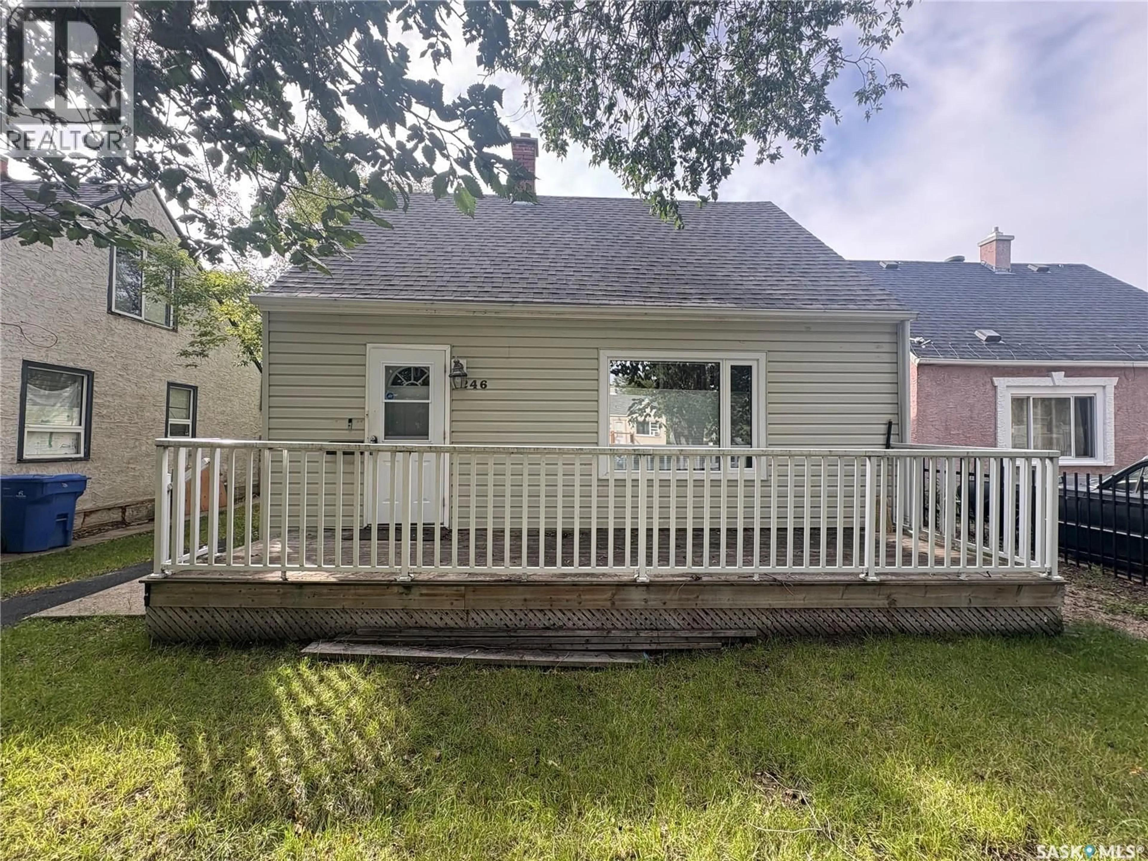 Home with vinyl exterior material, street for 1246 QUEEN STREET, Regina Saskatchewan S4T4B4