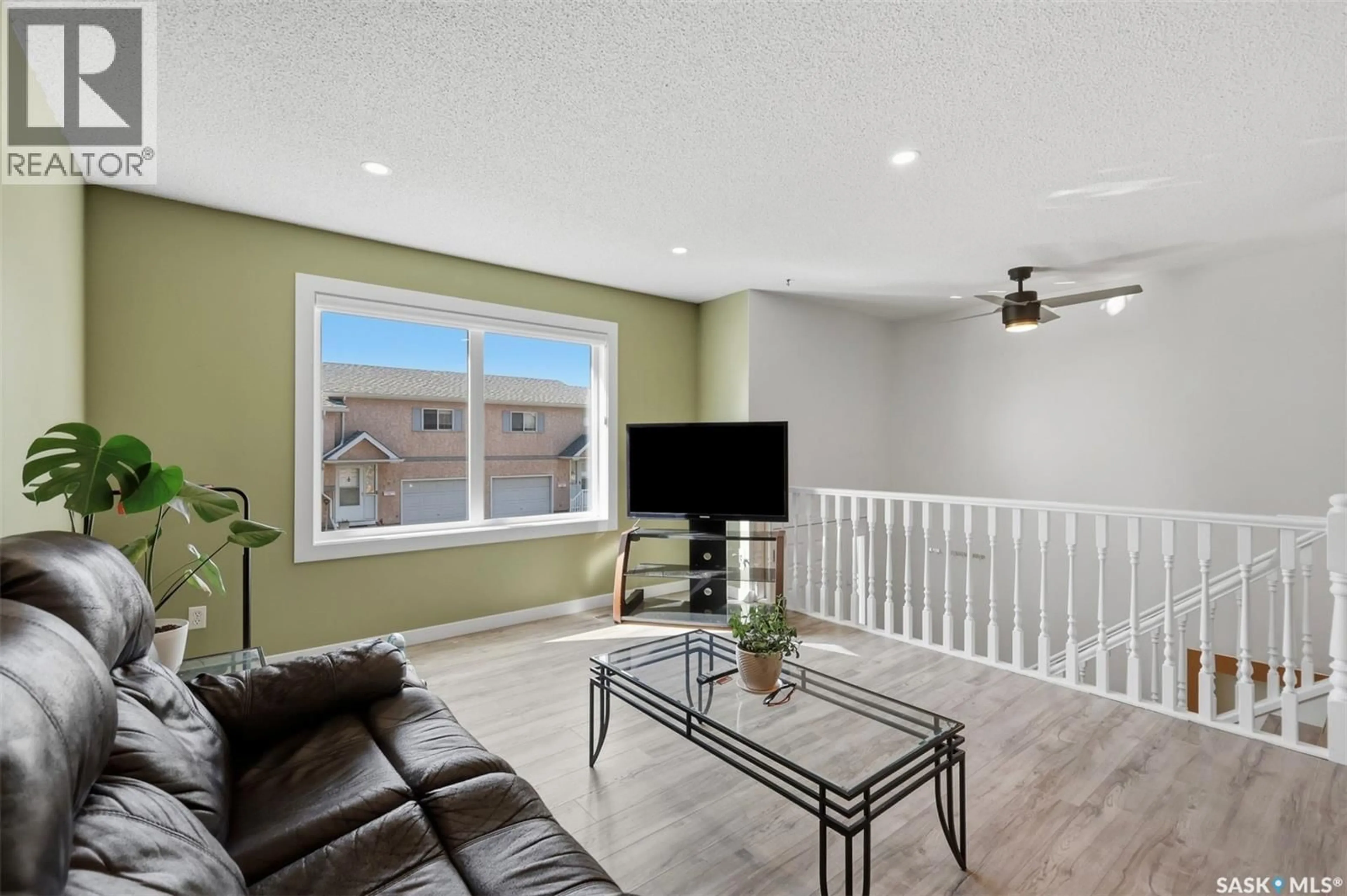 Living room with furniture, unknown for 506 510 PEREHUDOFF CRESCENT, Saskatoon Saskatchewan S7N4H6