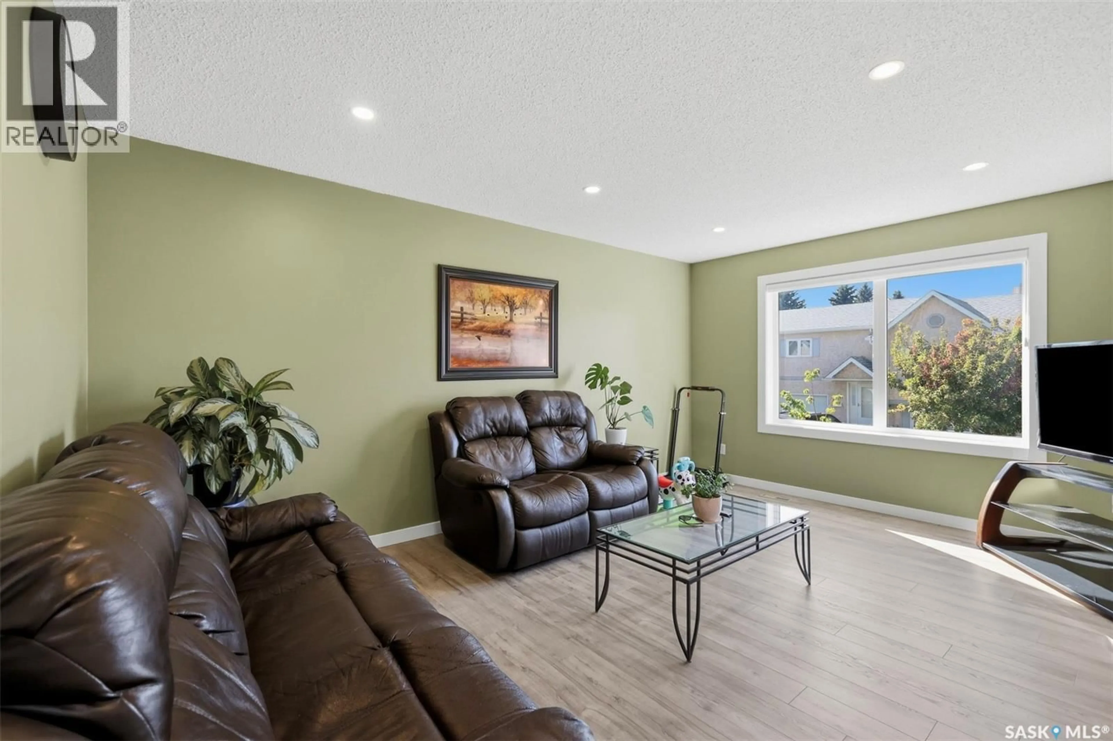 Living room with furniture, unknown for 506 510 PEREHUDOFF CRESCENT, Saskatoon Saskatchewan S7N4H6