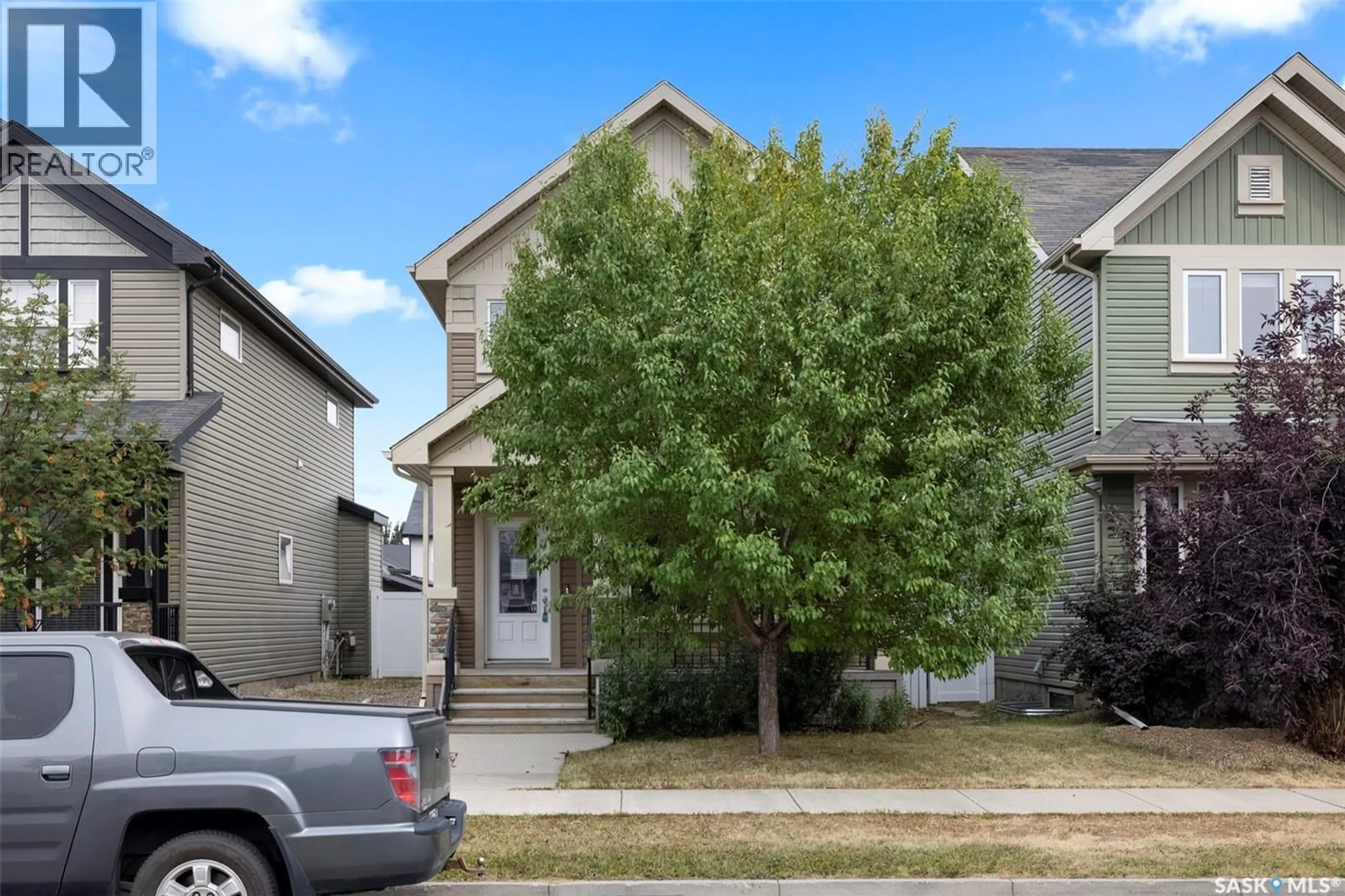 Home with vinyl exterior material, street for 3604 GREEN MOSS LANE, Regina Saskatchewan S4V1M2