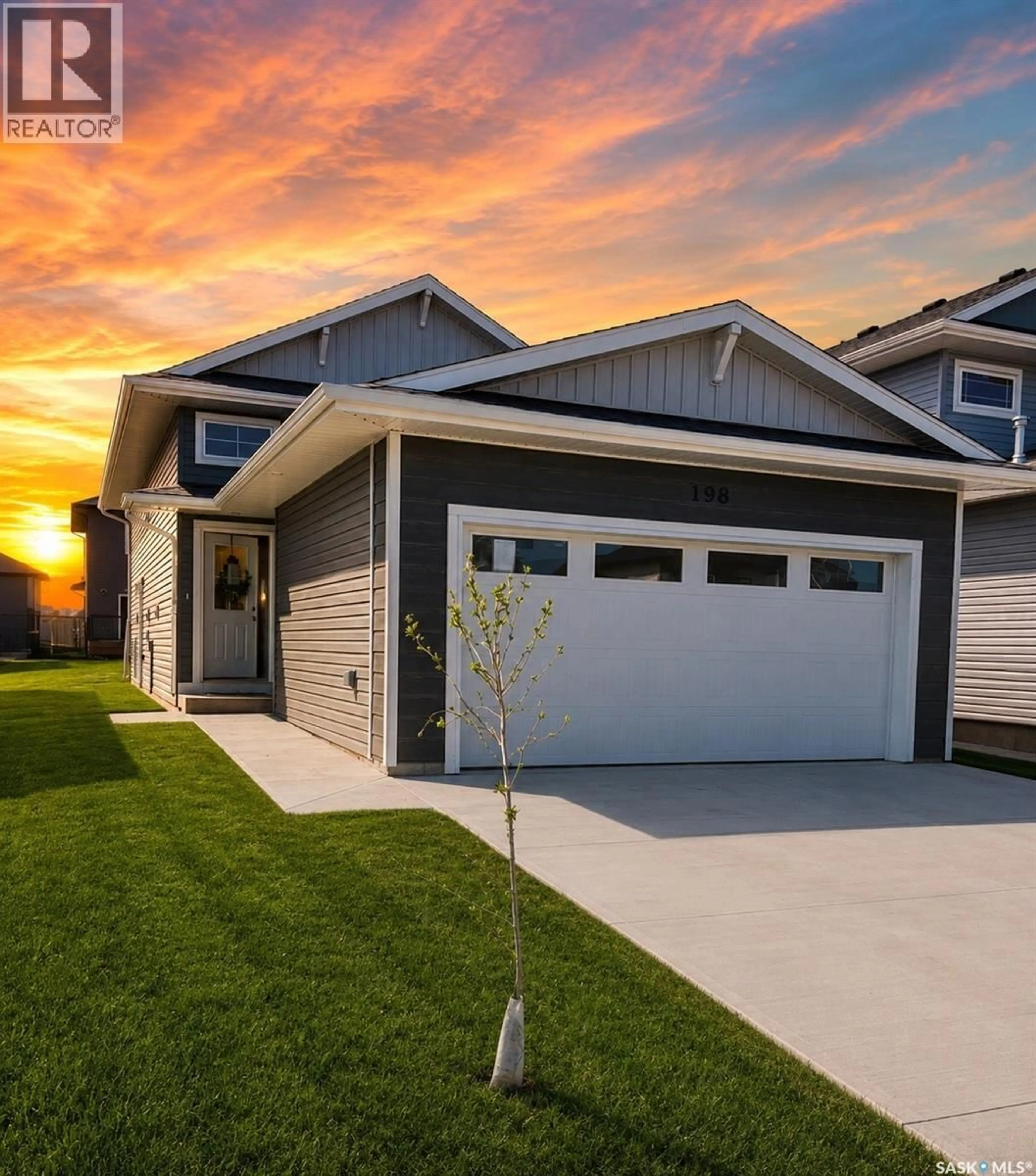 Home with vinyl exterior material, street for 598 YUEL CRESCENT, Saskatoon Saskatchewan S7W1N9