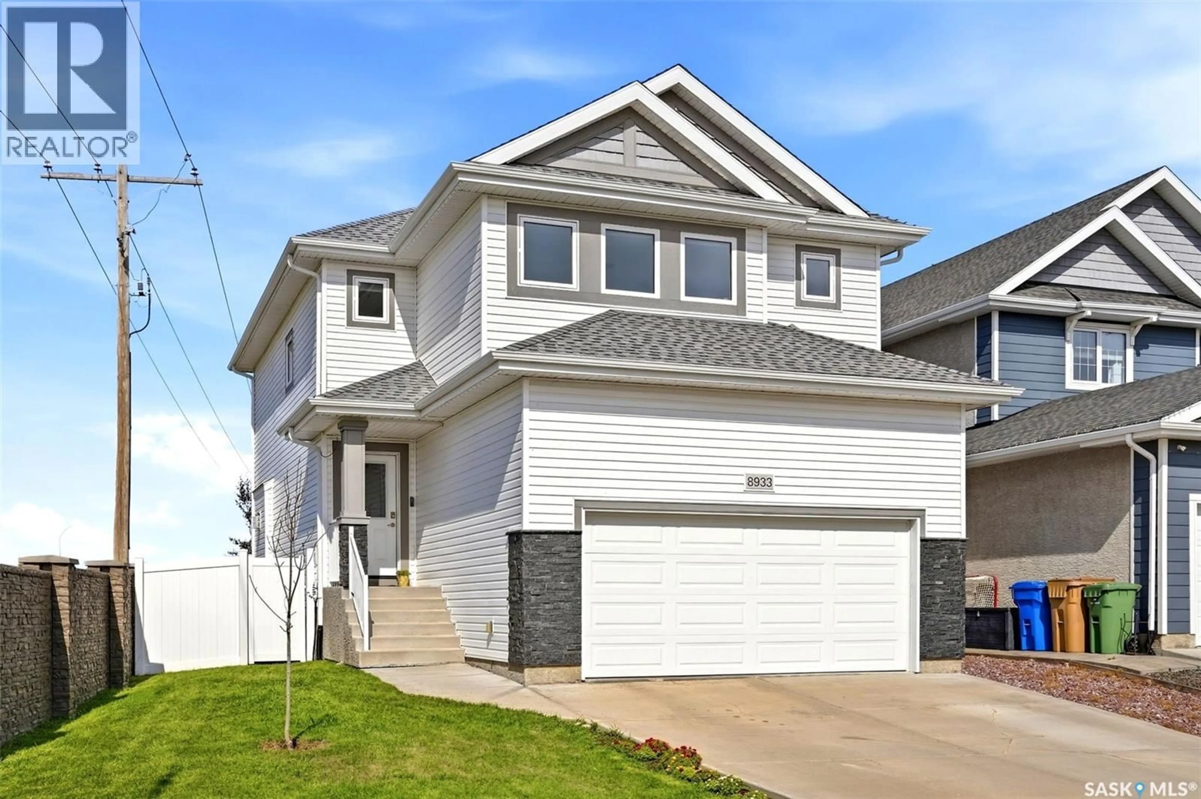 Home with vinyl exterior material, street for 8933 KESTRAL DRIVE, Regina Saskatchewan S4Y0C2