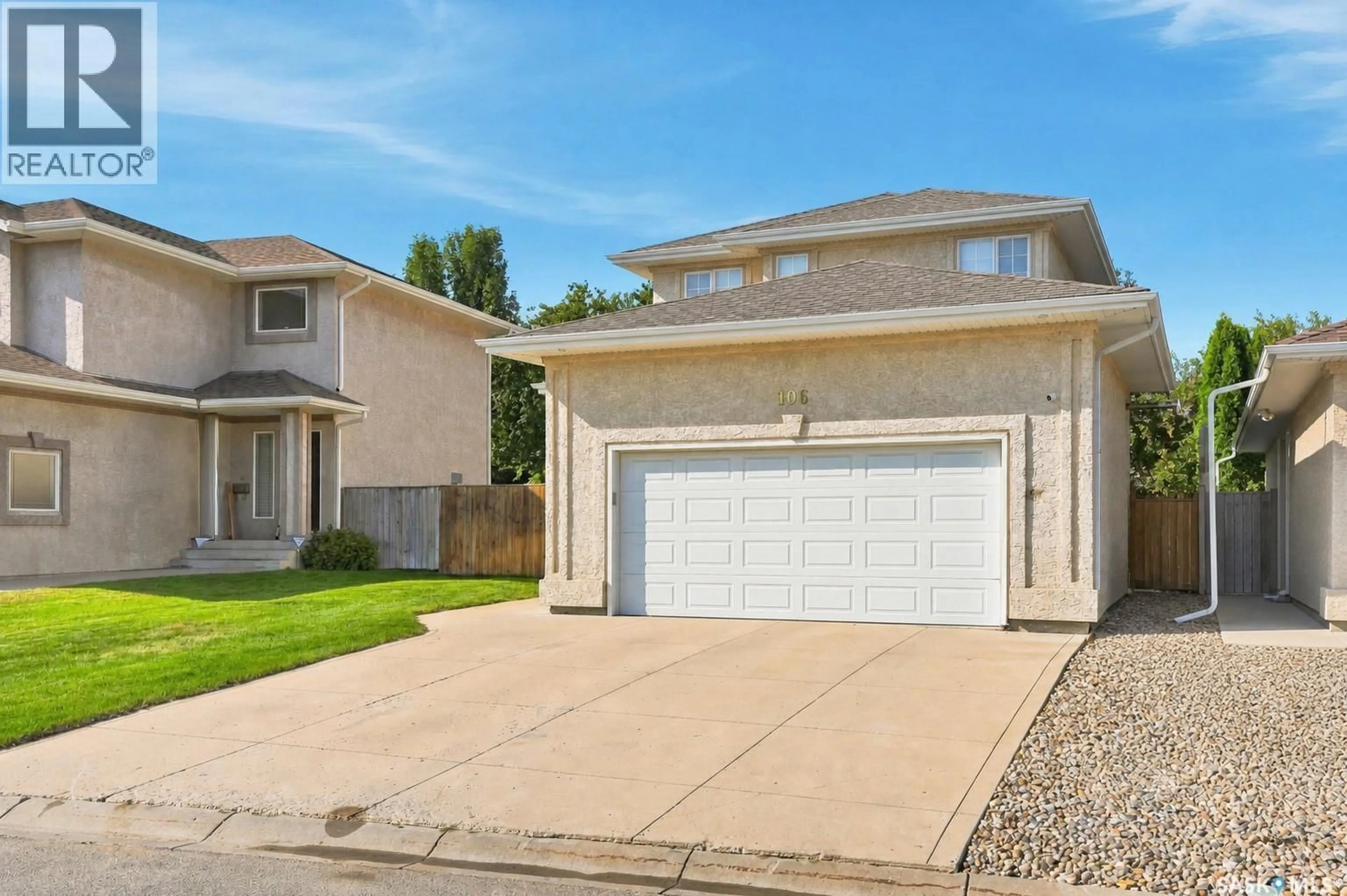 Home with vinyl exterior material, street for 106 SEARS COVE, Saskatoon Saskatchewan S7N4V5