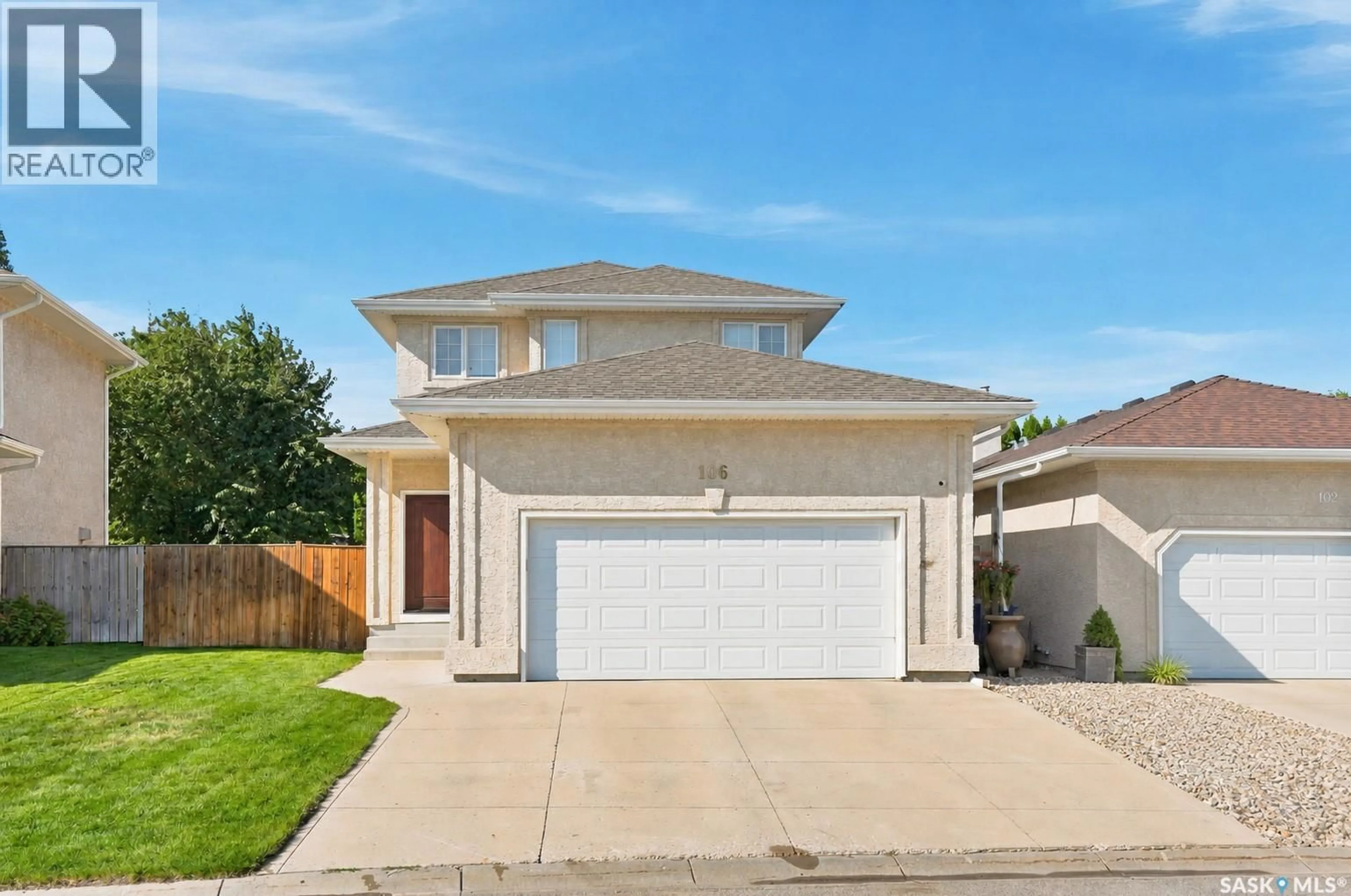 Home with vinyl exterior material, street for 106 SEARS COVE, Saskatoon Saskatchewan S7N4V5